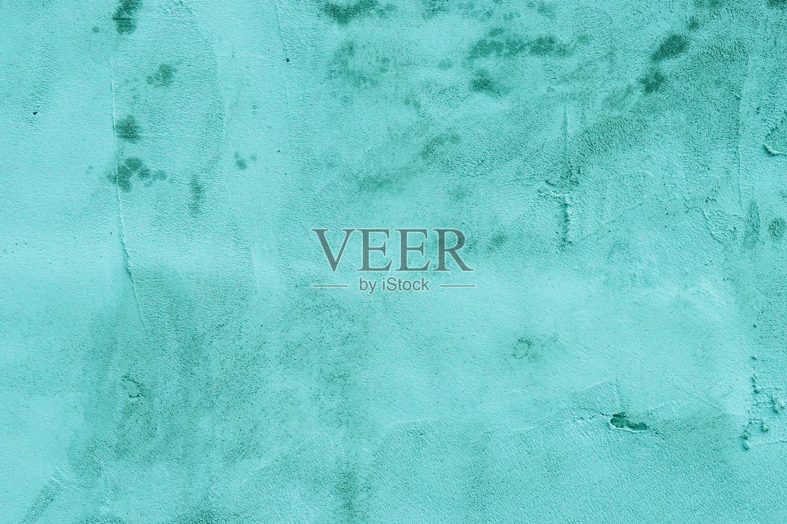 墙上涂着粗糙的腻子。照片摄影图片