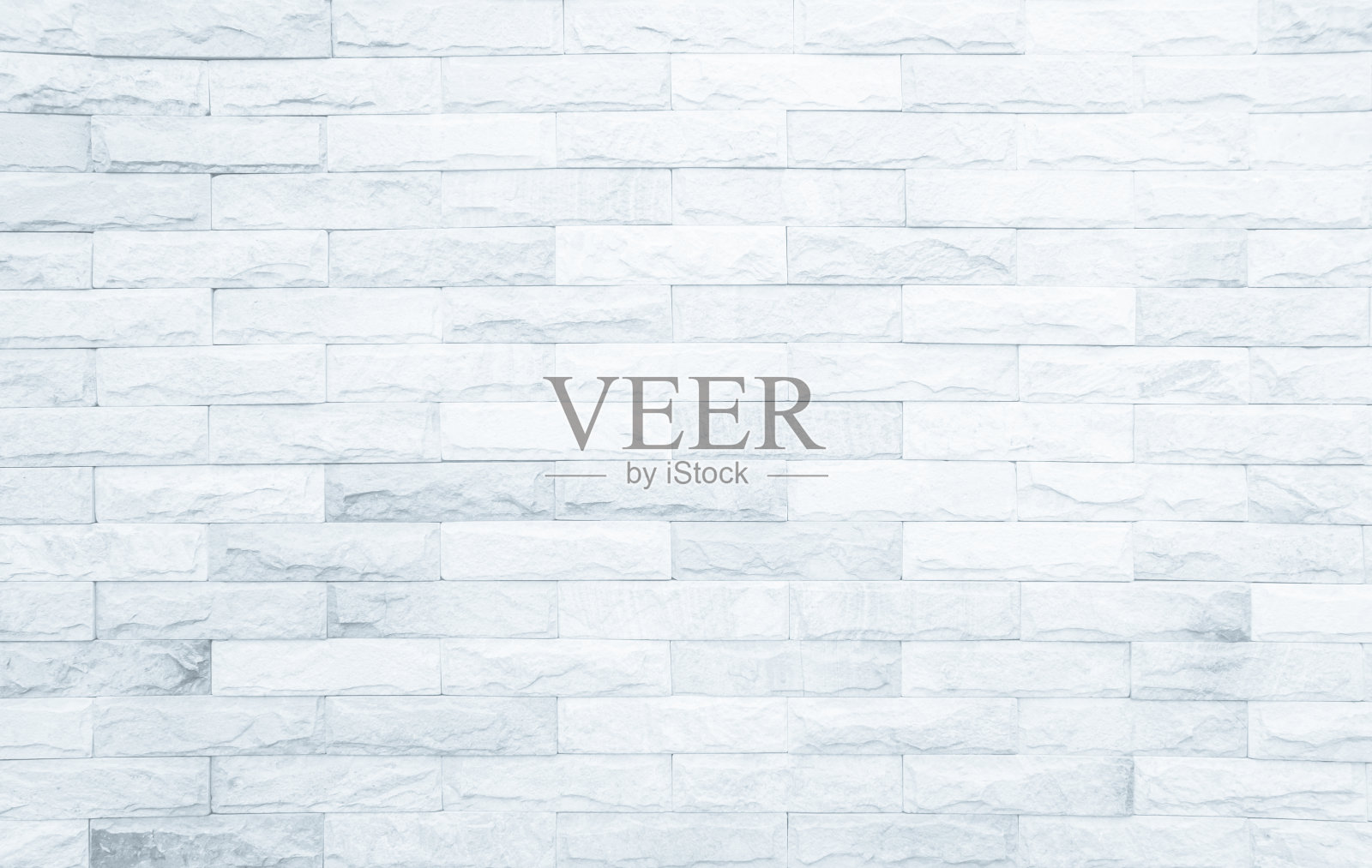 现代白色砖墙背景照片的细节。白色砖墙纹理背景为石瓦块，涂以灰色浅色壁纸现代内外和背景设计。照片摄影图片