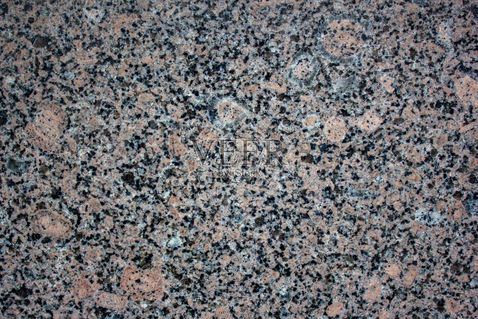 深色原装花岗岩。花岗岩石材、质地、设计。花岗岩立面，表面粗糙，细节背景。照片摄影图片