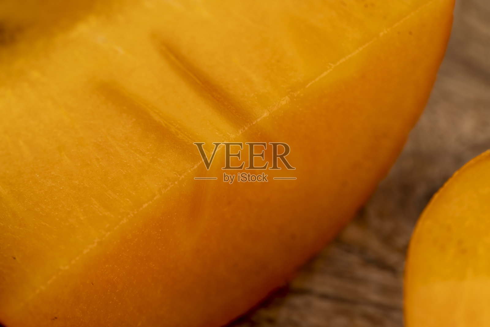 半熟的橘子柿子，近一点照片摄影图片