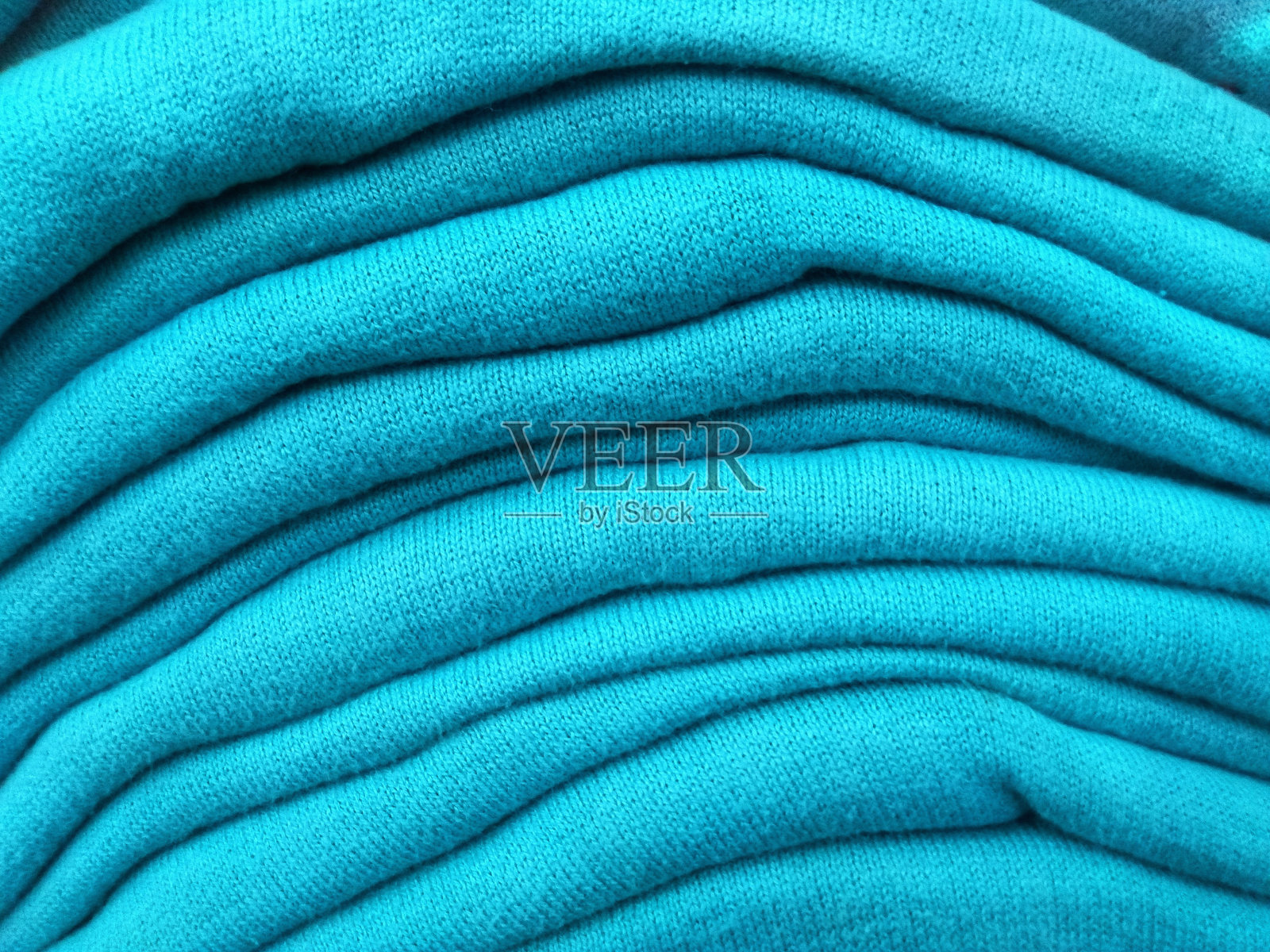 近距离观察毛衣的纹理堆叠照片摄影图片