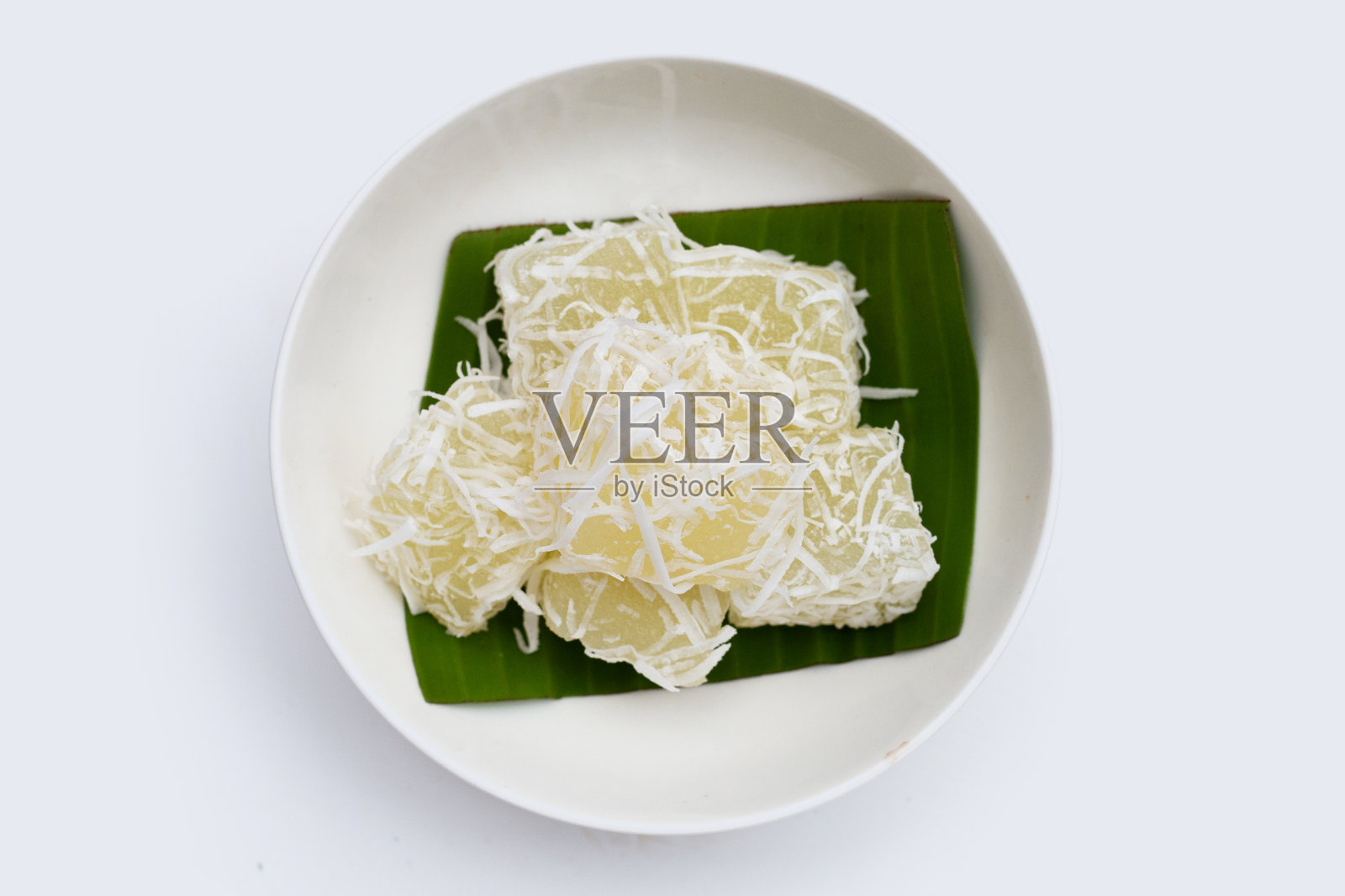 蒸木薯蛋糕或木薯蛋糕与磨碎的椰子照片摄影图片