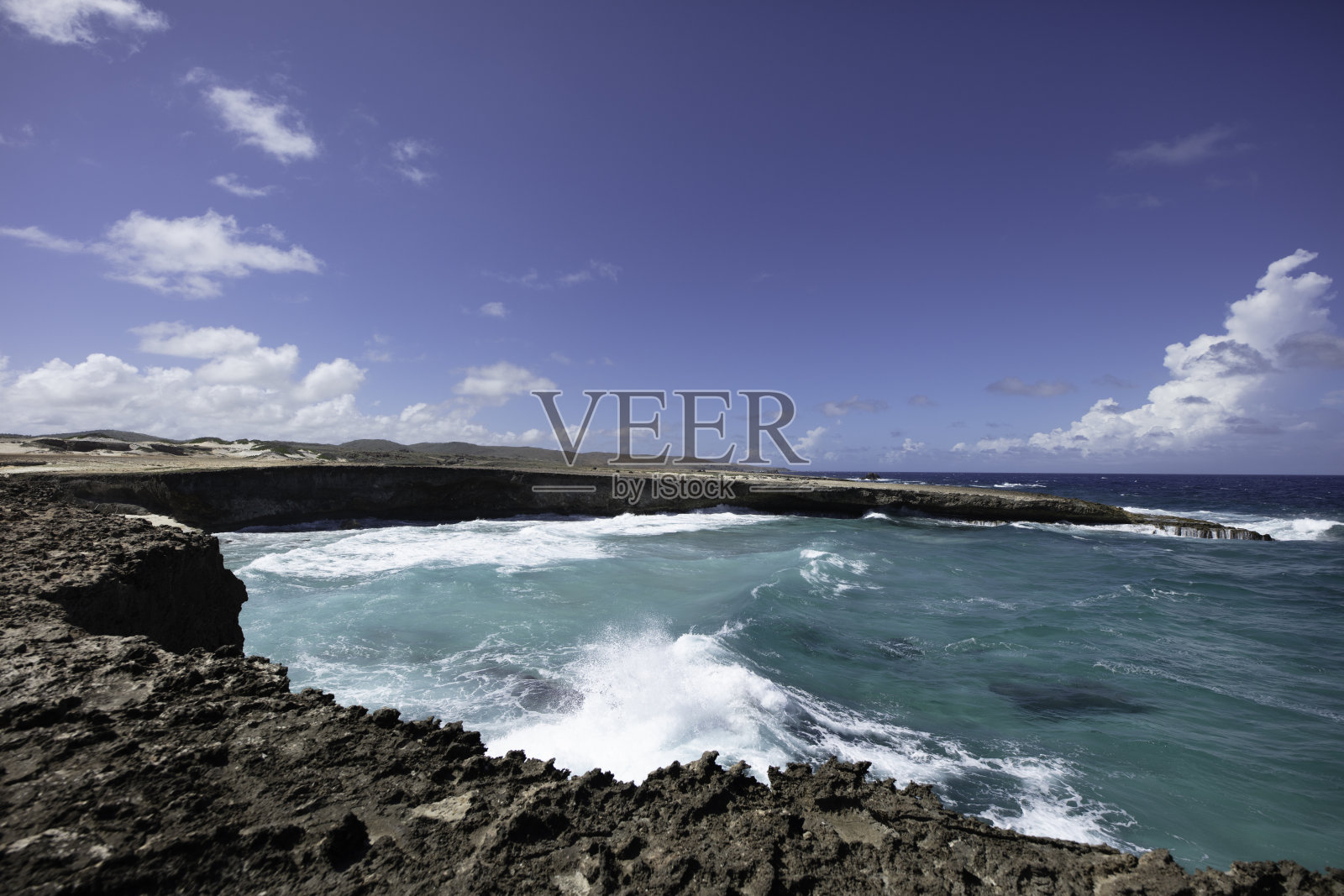 多岩石的海岸线照片摄影图片