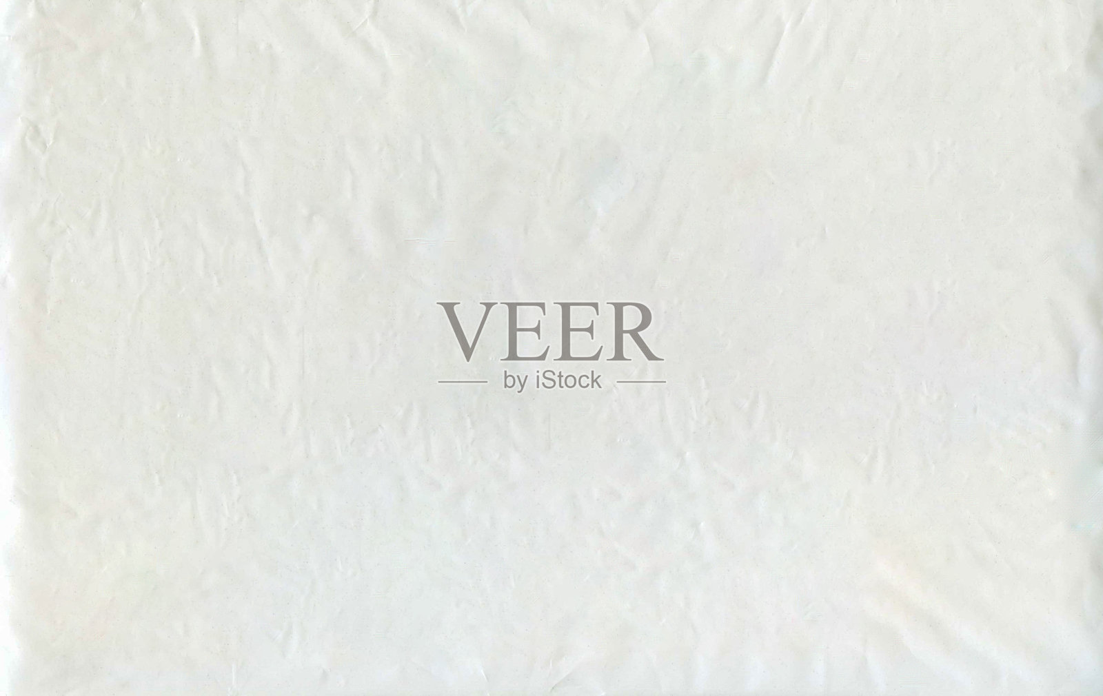 添加d2w添加剂的生态包装或塑料袋的白色背景纹理。这种塑料不会对环境构成威胁，也不会对动物和植物构成危险。照片摄影图片