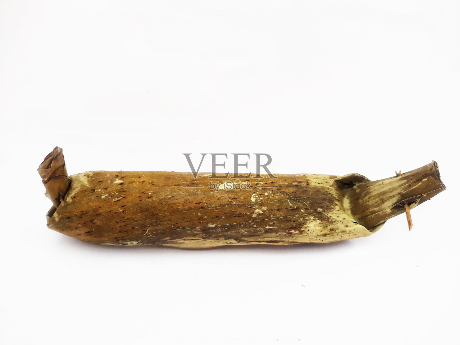 龙通是用香蕉叶包裹的米饭照片摄影图片