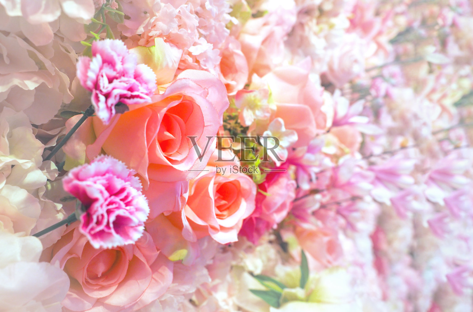 粉红色的花束情人节或婚礼的背景。照片摄影图片