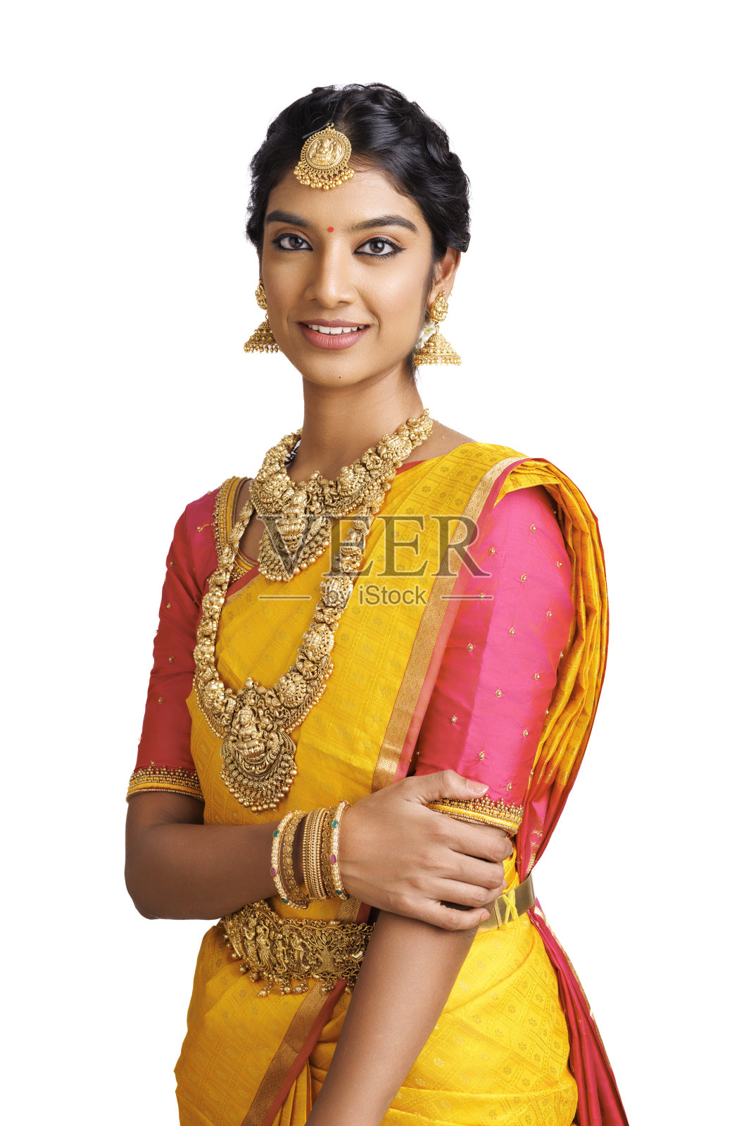 美丽的印度女人穿着传统服装，戴着珠宝。照片摄影图片