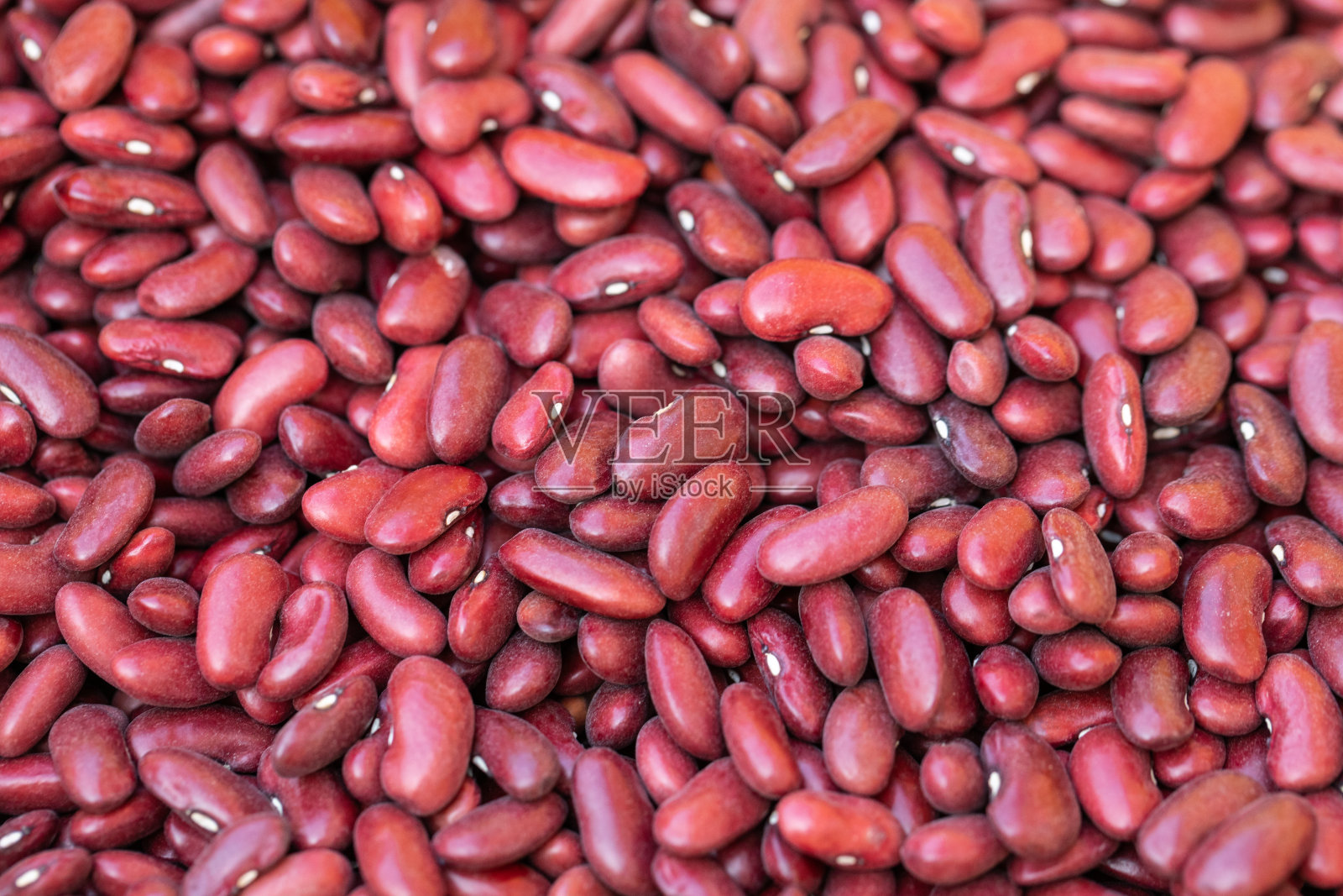 晒干的红豆种子闭合。红豆的背景。健康饮食理念照片摄影图片