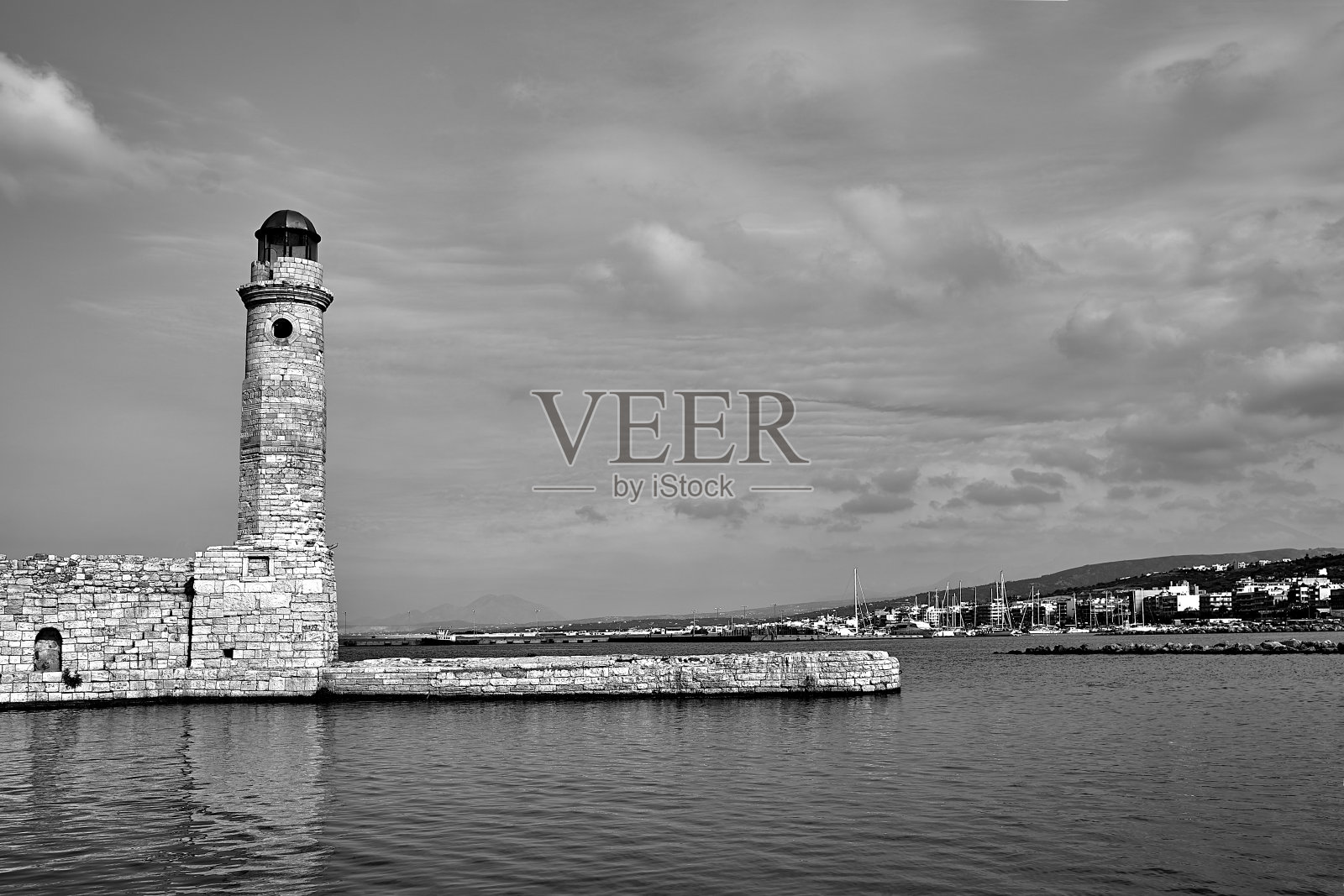 克里特岛雷希姆诺港历史悠久的灯塔照片摄影图片