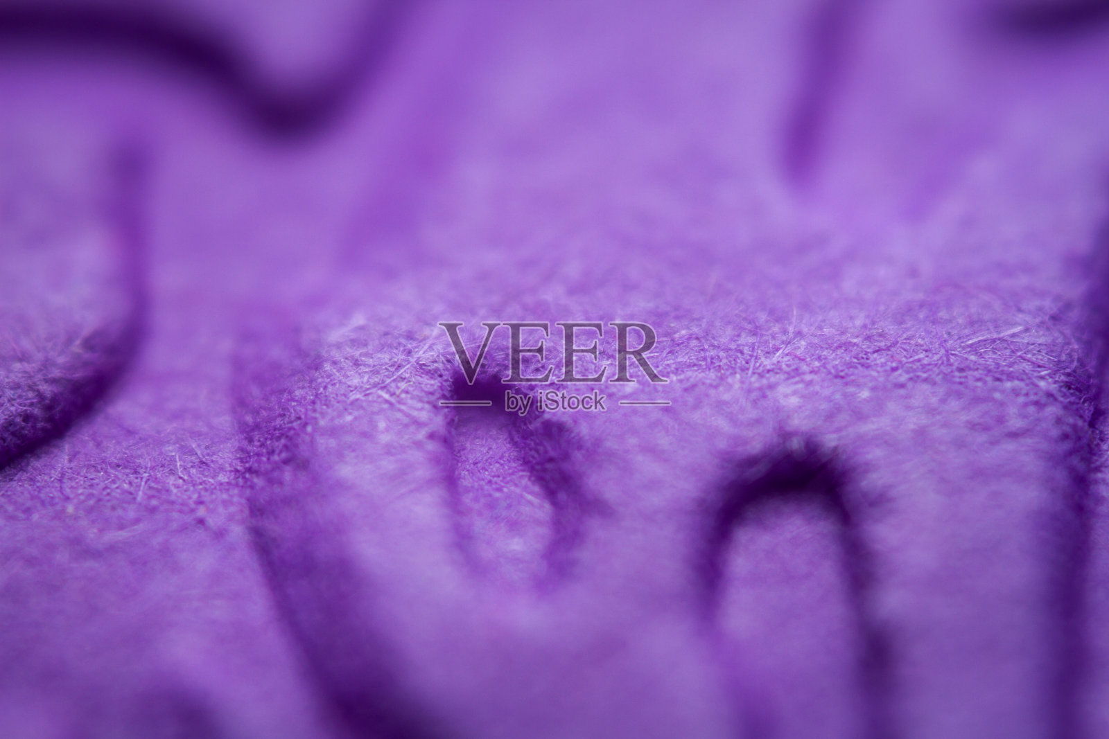 极宏压花紫色纸照片摄影图片