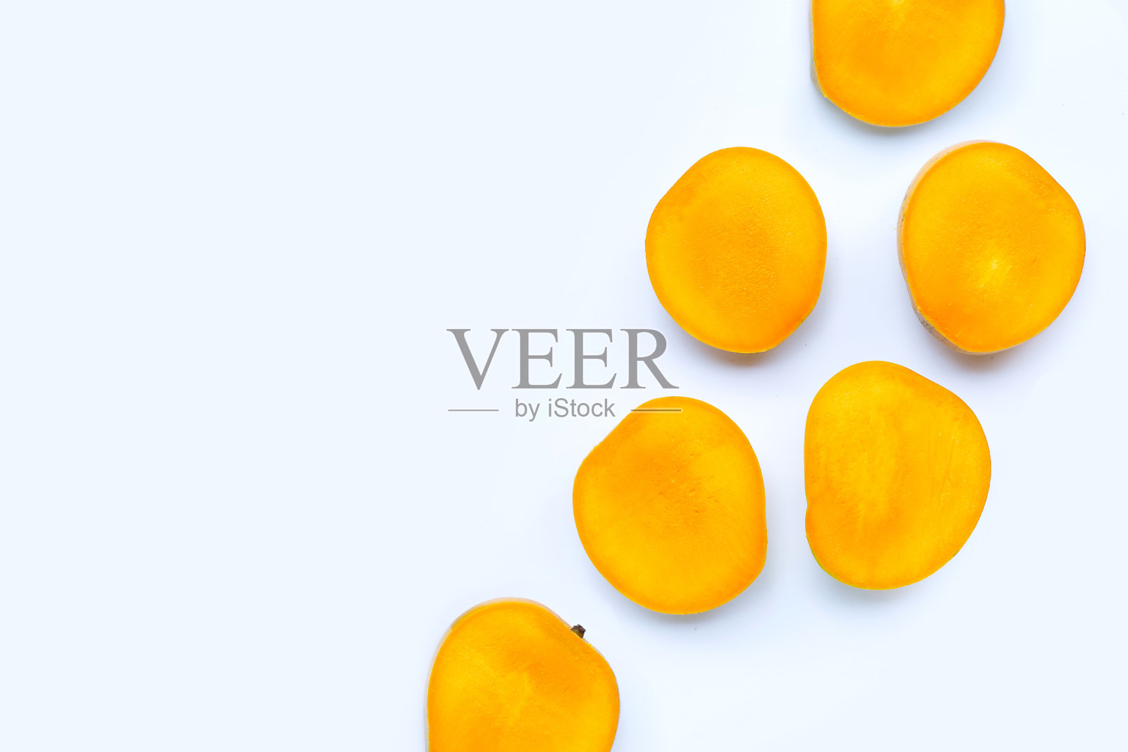 热带水果，白色背景上的芒果。照片摄影图片