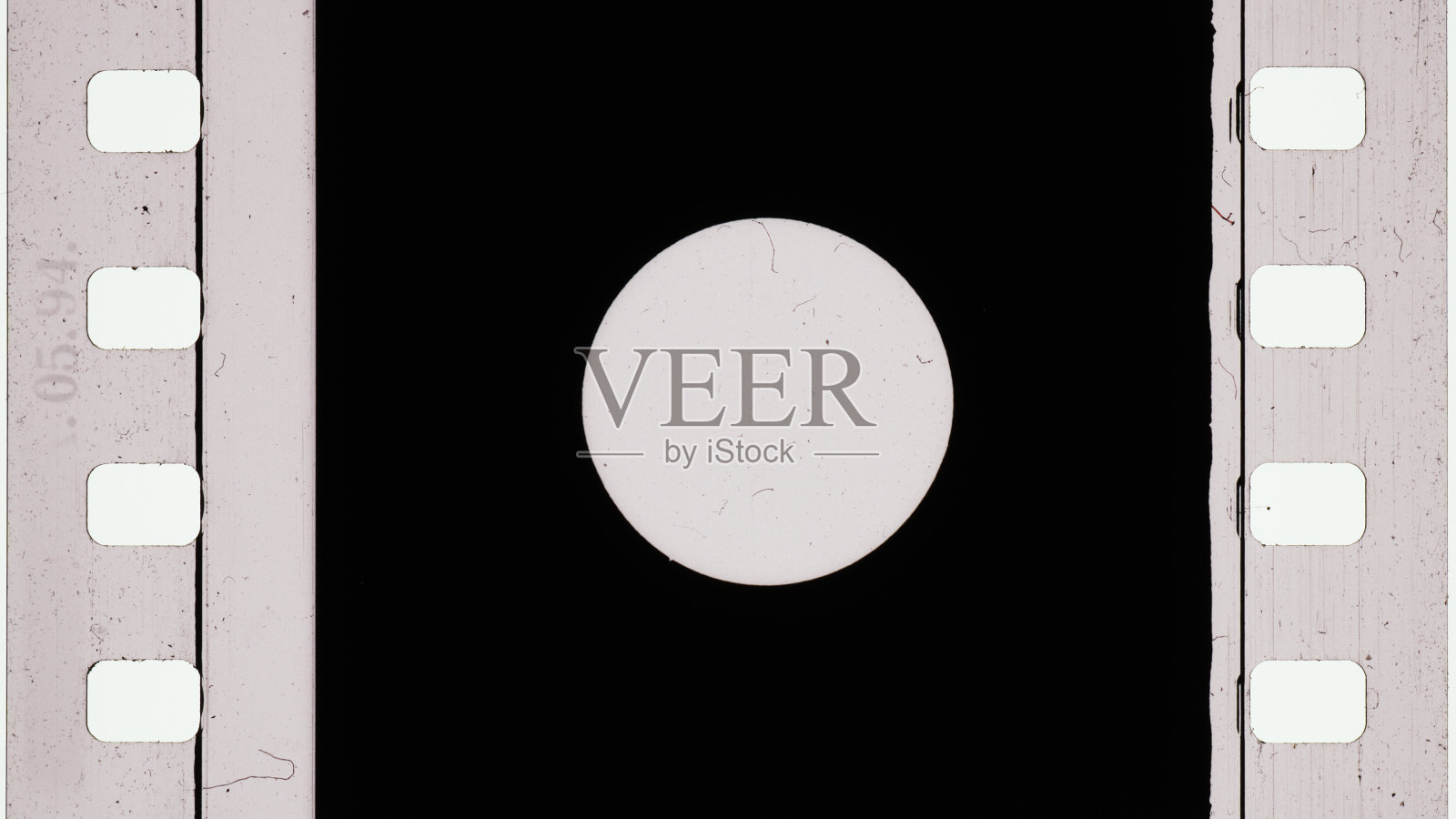 带孔标记的胶片打孔机照片摄影图片