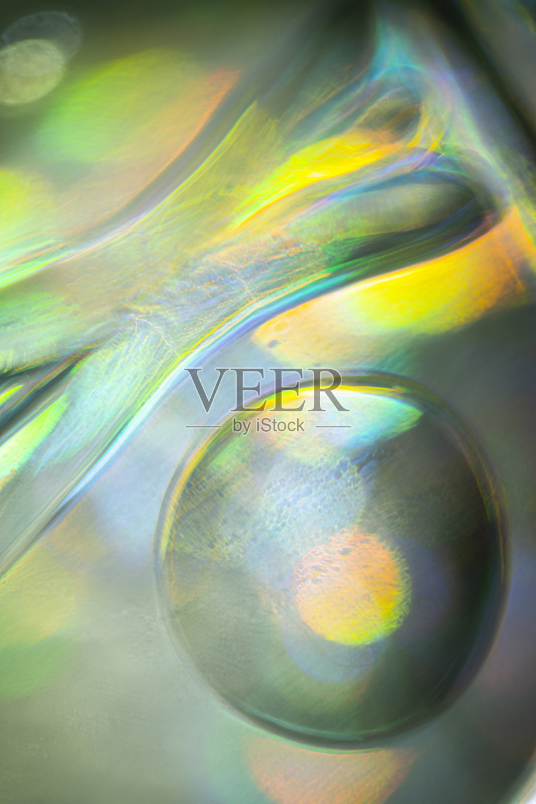 抽象生动的彩色图案。偏振光透过玻璃结构观看。动感缤纷的艺术背景。照片摄影图片