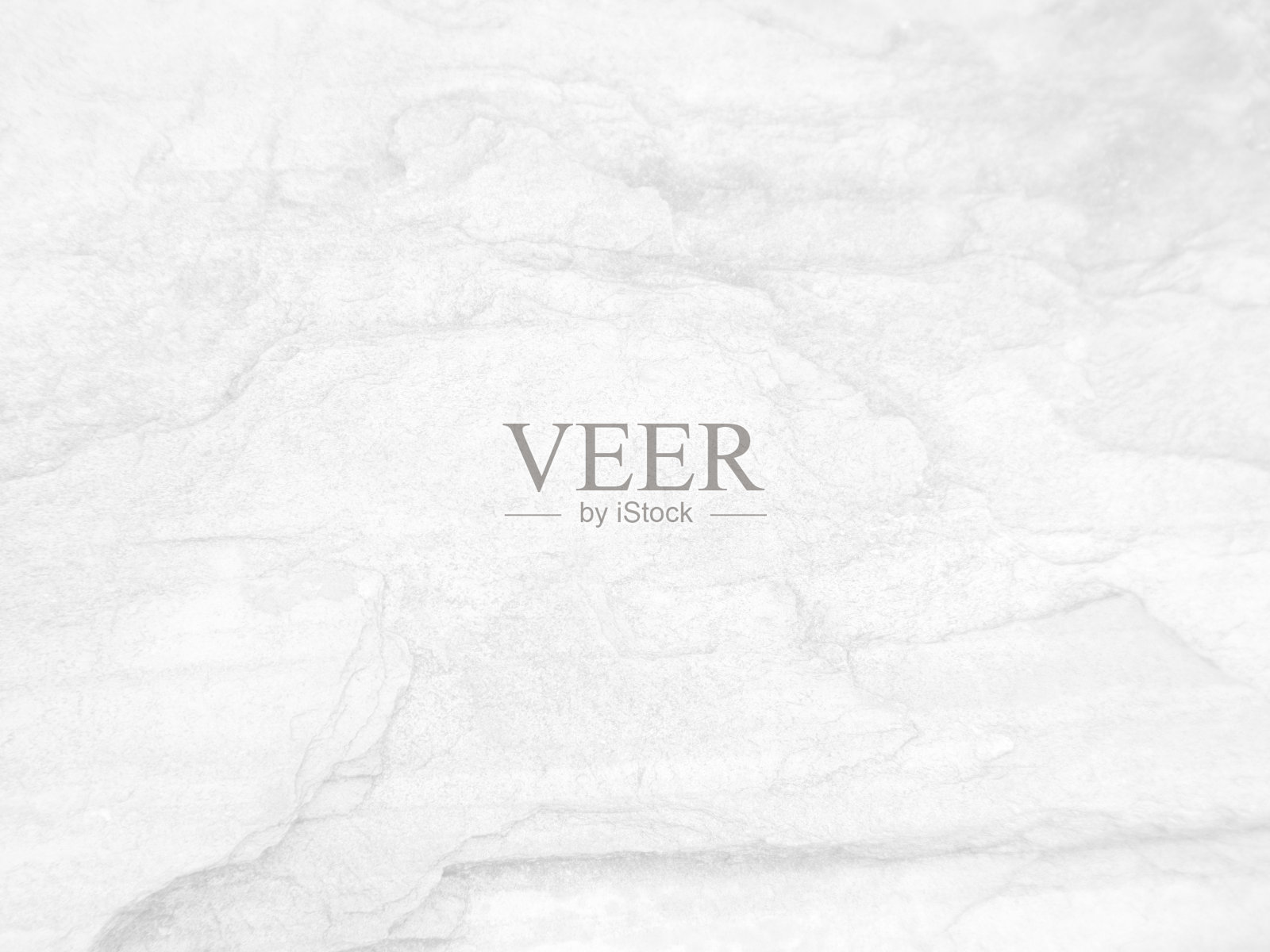 白石表面纹理粗糙，色调灰白色。使用这个壁纸或背景图像。有一个空白的地方用来放文字。照片摄影图片