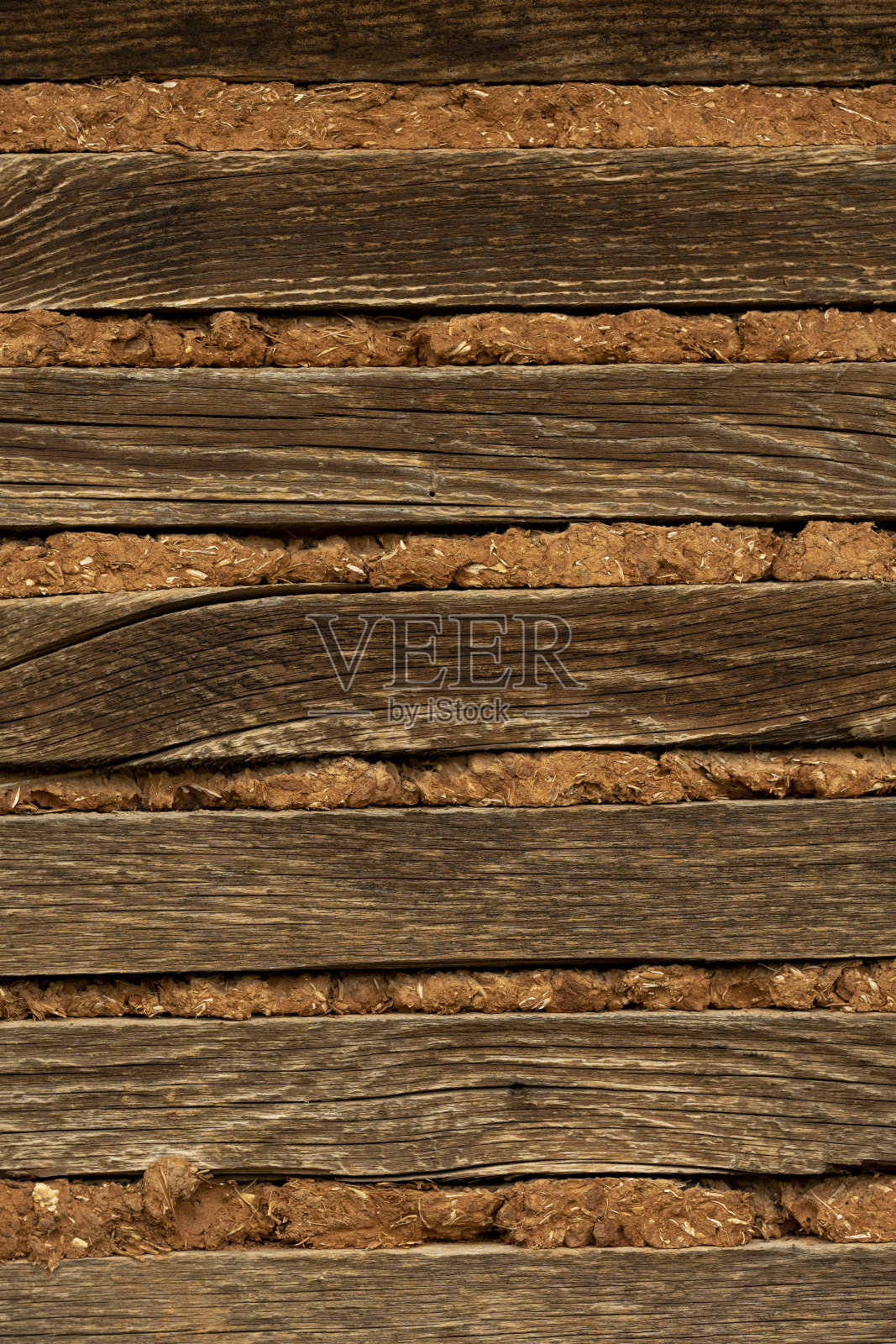 木材，稻草和土壤背景。谷仓的墙。不寻常的背景与签名空间。照片摄影图片