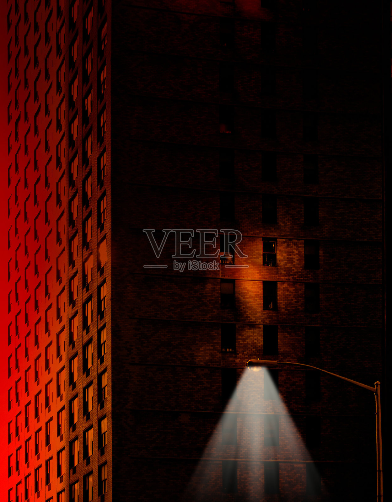 令人毛骨悚然的城市景观，高楼大厦和黑暗中的路灯照片摄影图片