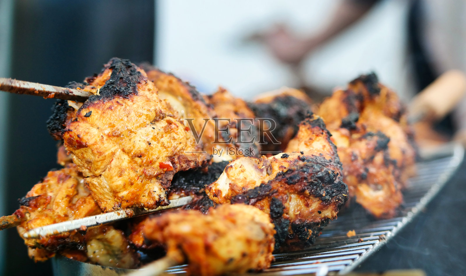 烤鸡正在煮照片摄影图片