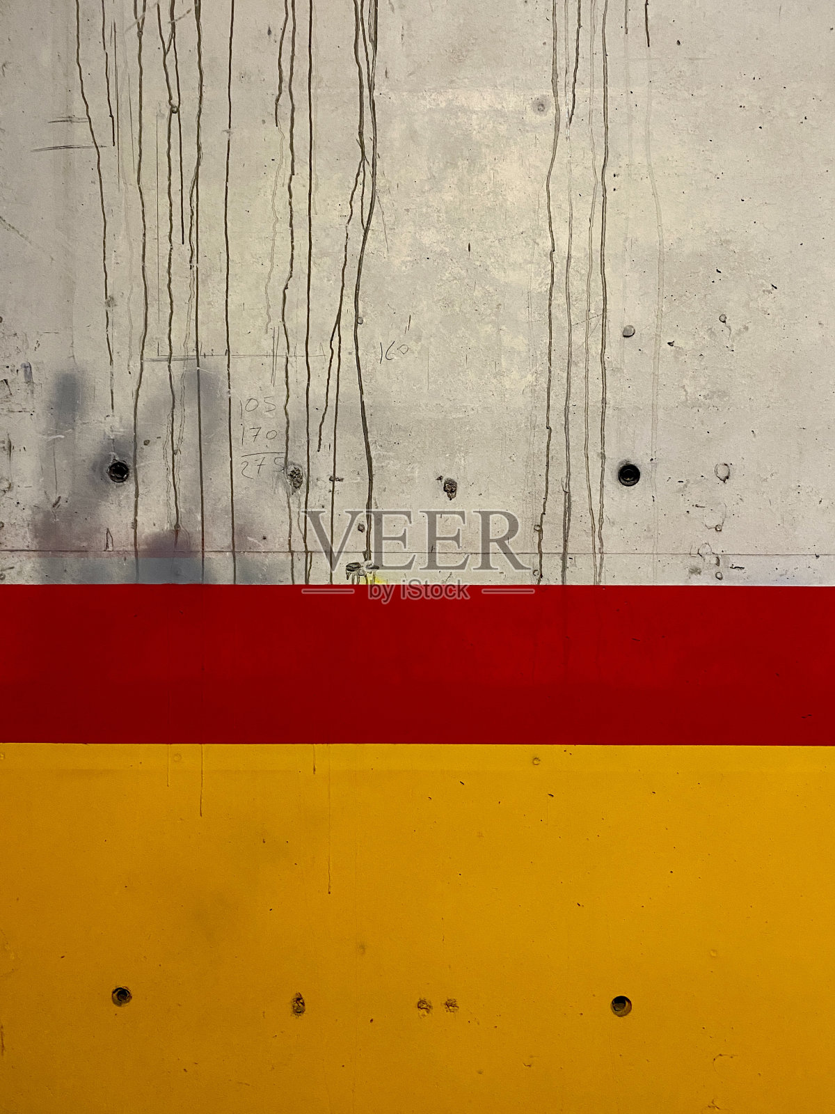 裸露的混凝土墙呈黄红色照片摄影图片