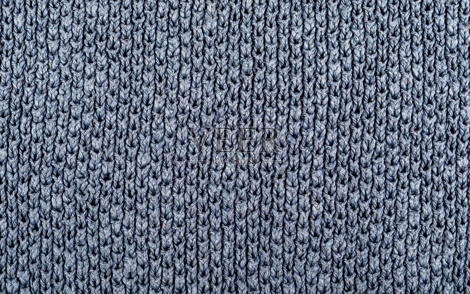 蓝色棉针织质地。背景和纹理。特写镜头。照片摄影图片