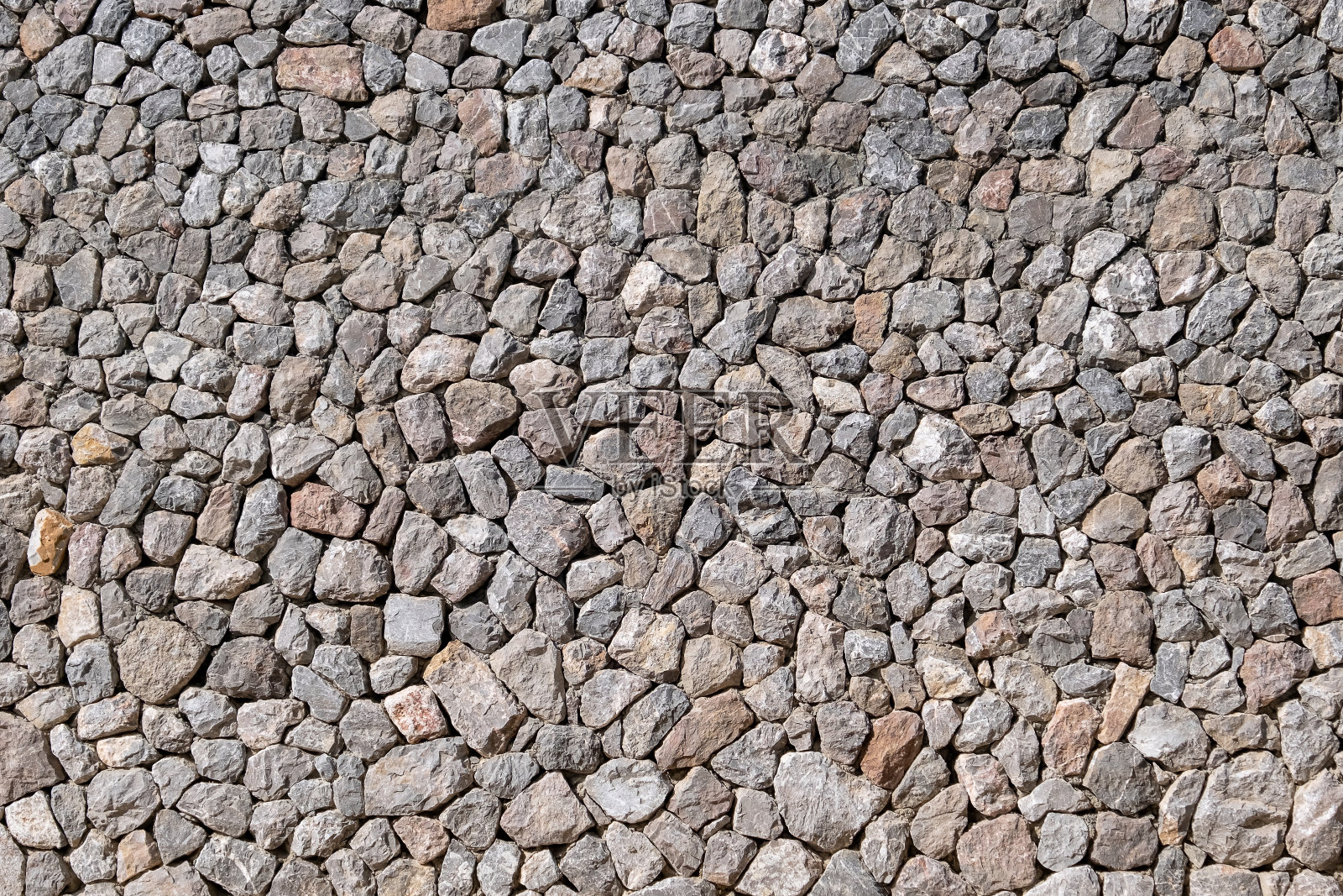 古色古香的石墙纹理材质建筑为背景。照片摄影图片