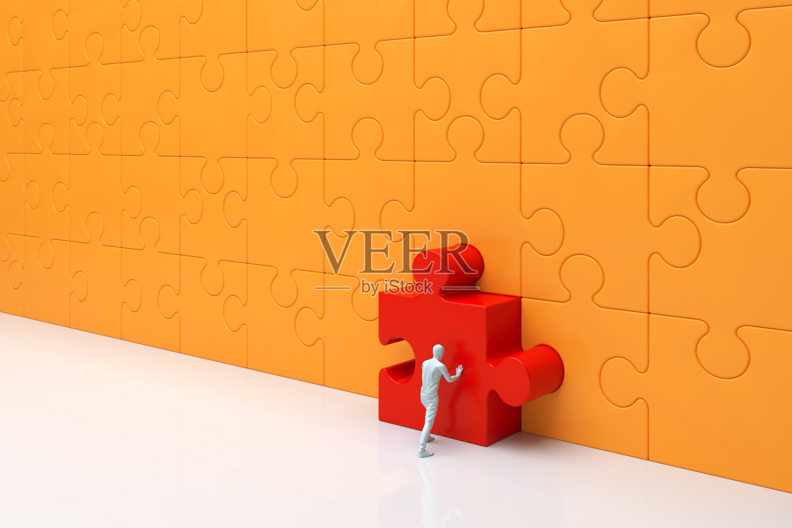 把最后一块拼图放好的人照片摄影图片