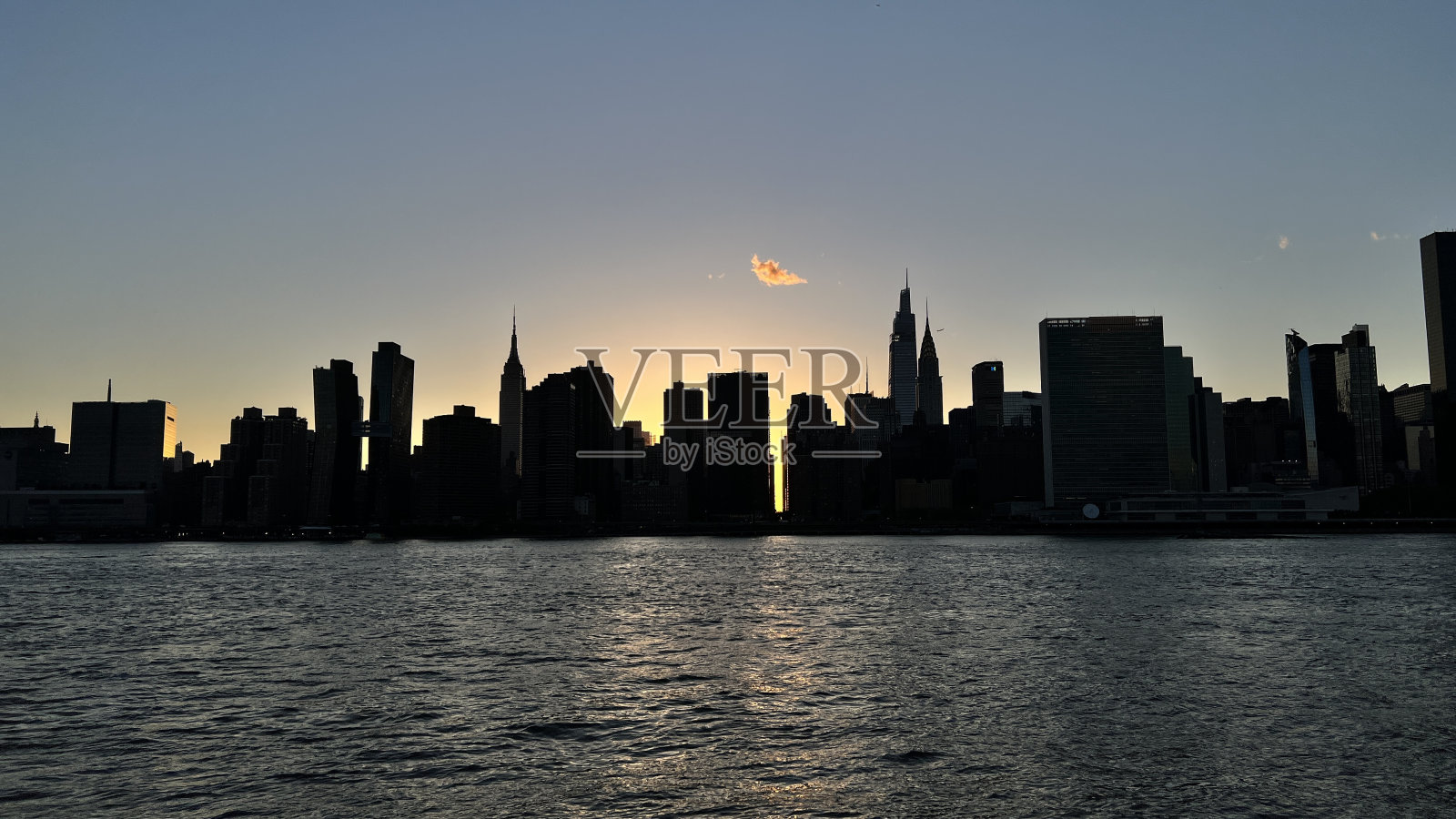 曼哈顿天际线的日落照片摄影图片