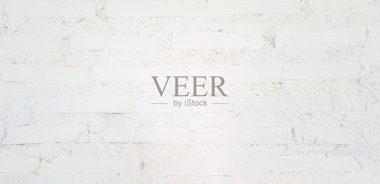 抽象的白色垃圾砖墙为背景。照片摄影图片