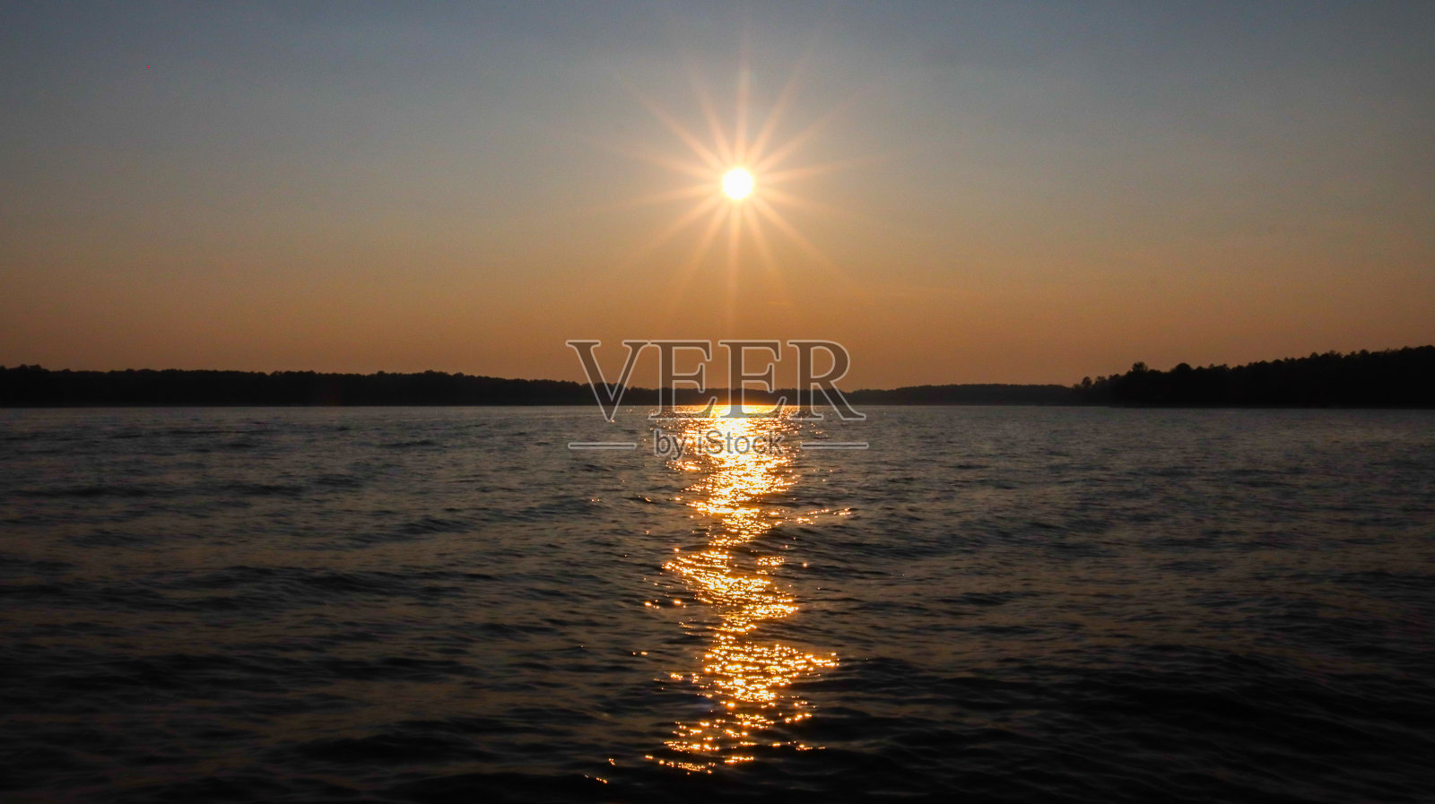 辛克莱湖弯弯曲曲的日落照片摄影图片