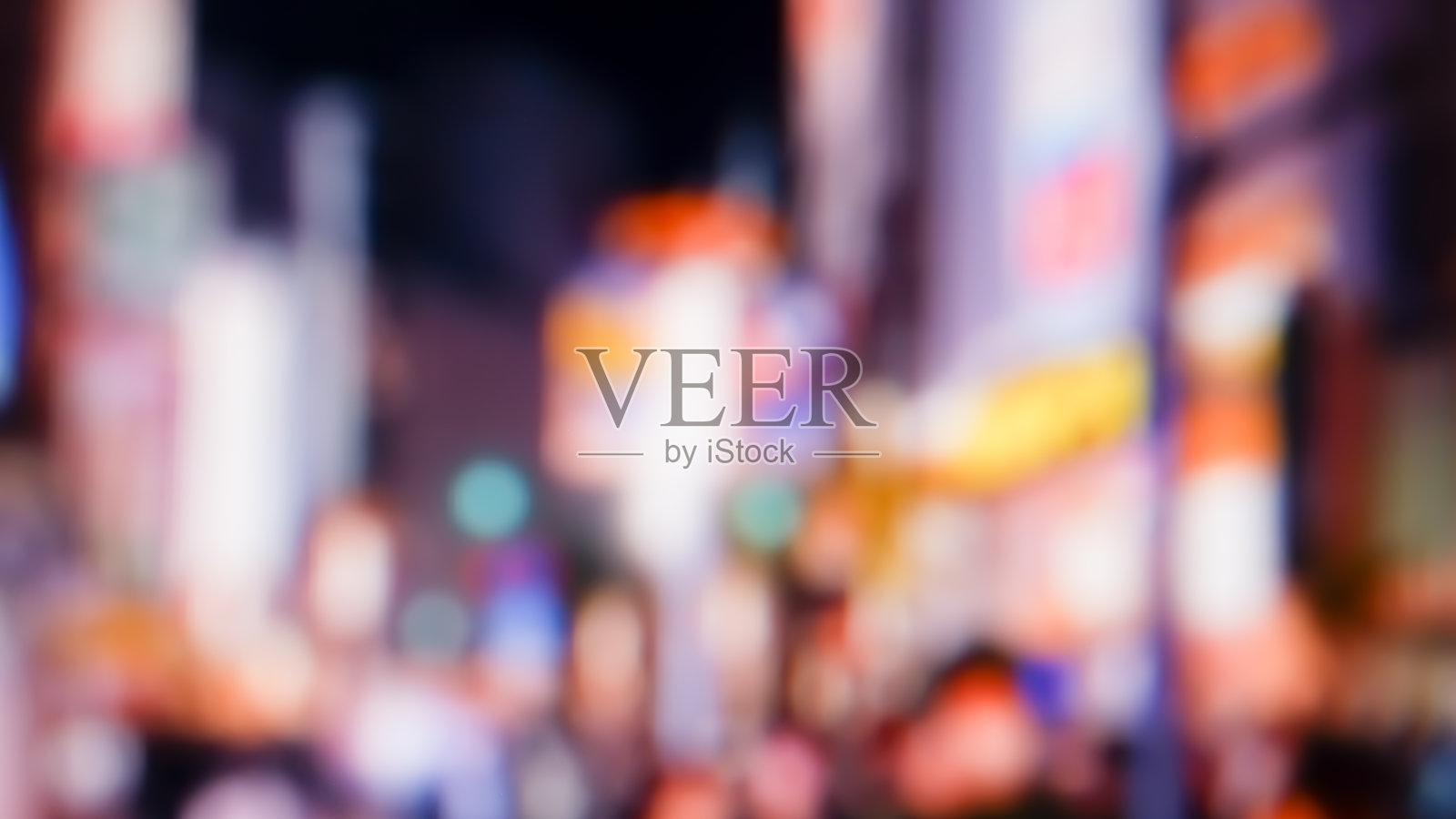 夜晚灯光模糊的街道背景。商场里灯光模糊照片摄影图片