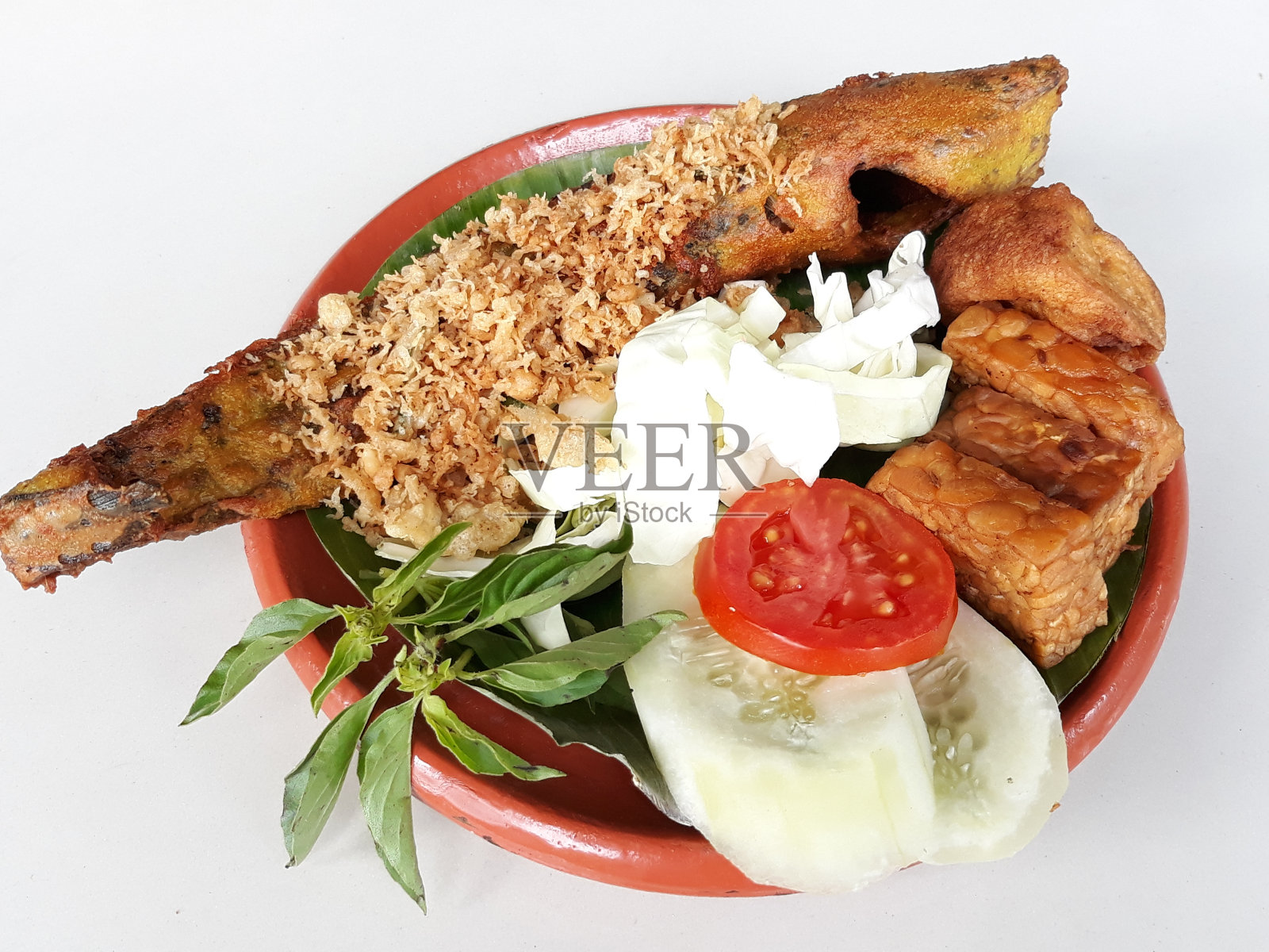 青菜炒鲶鱼照片摄影图片