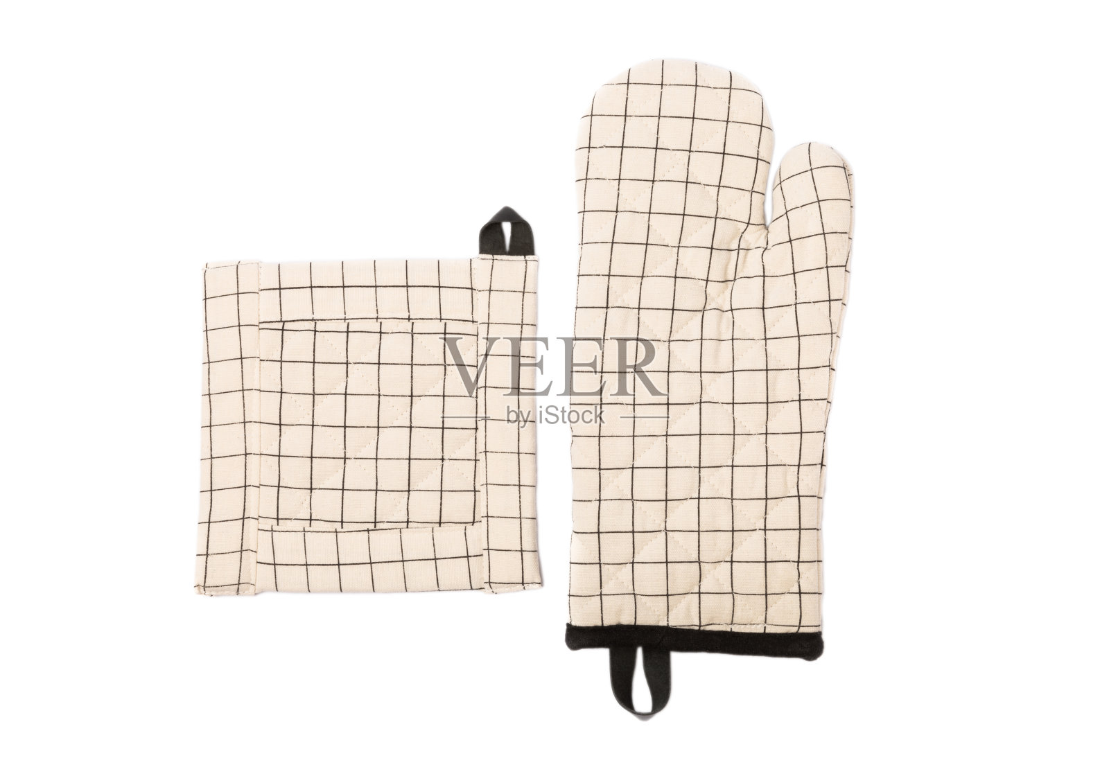 厨房用具。烤箱手套和热菜锅座隔离在白色背景。照片摄影图片