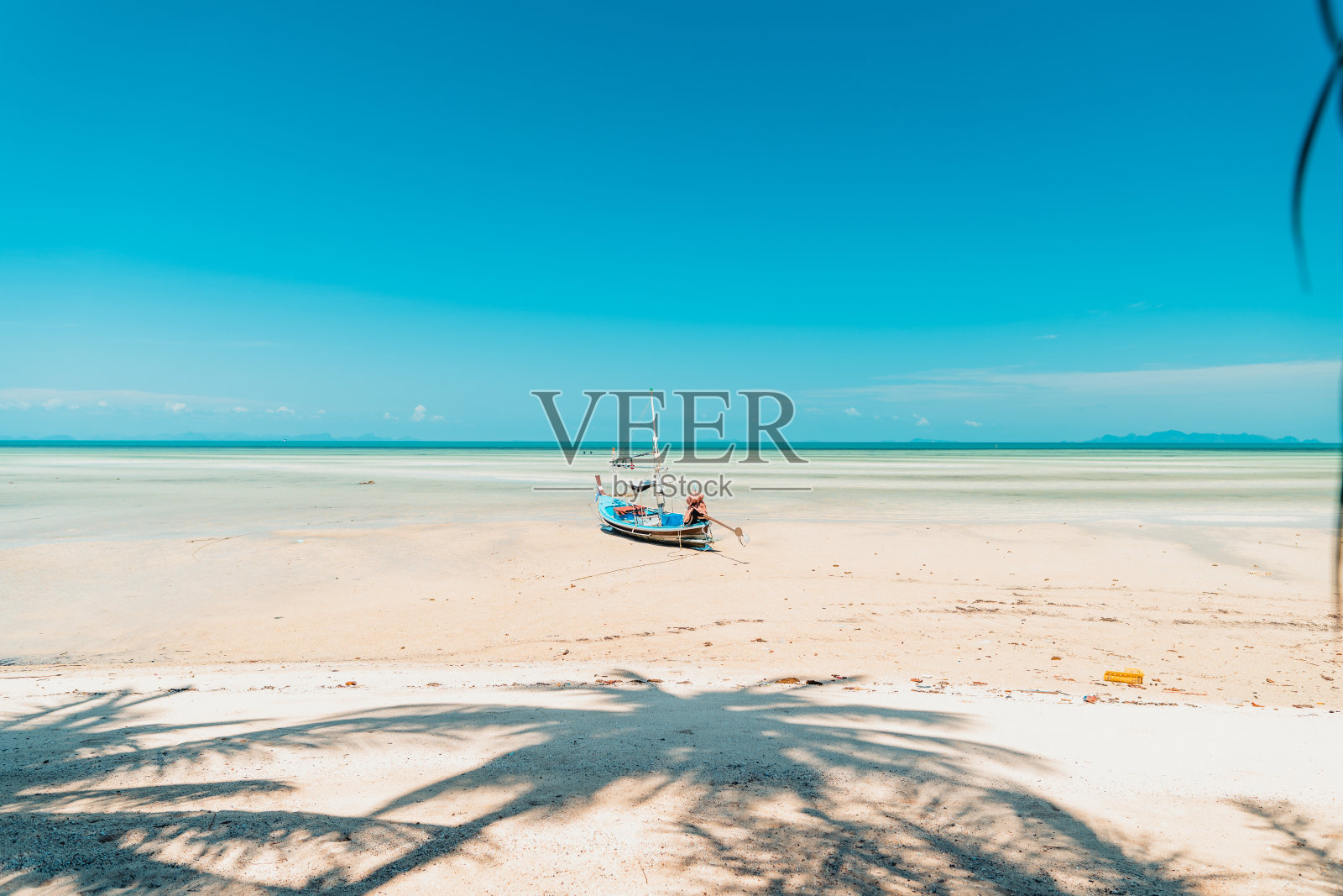 热带岛屿上的白色沙滩照片摄影图片