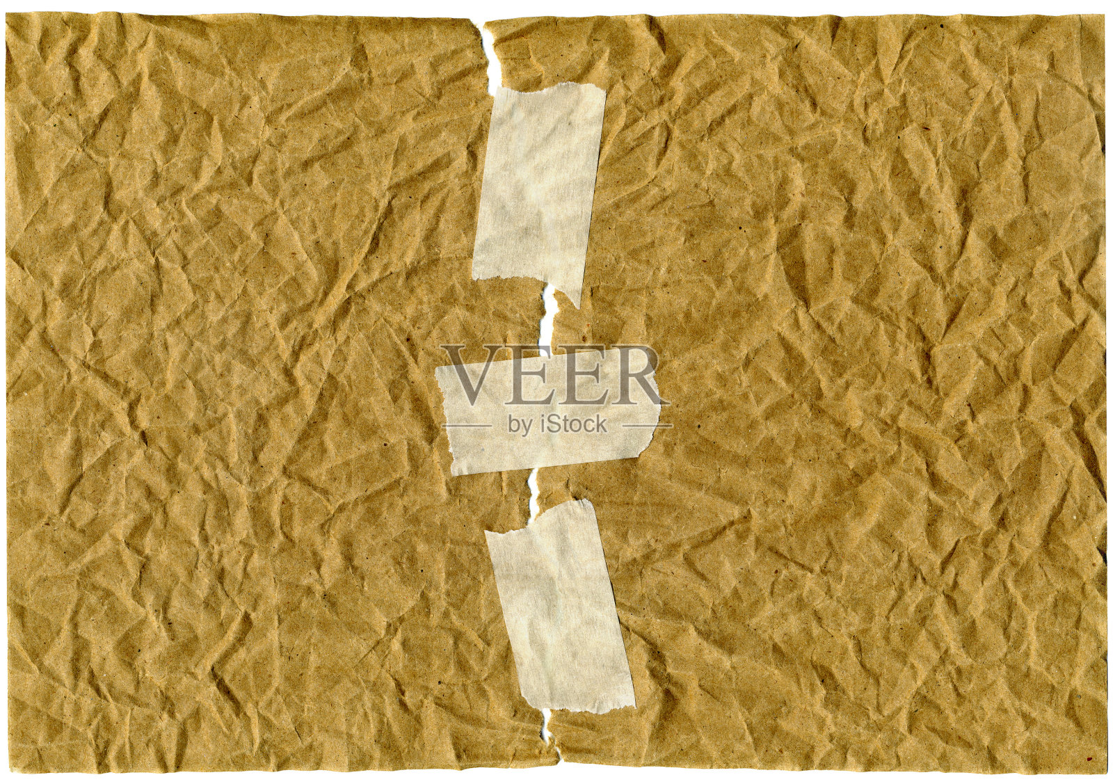 背景是皱巴巴的纸，用透明胶带粘在纸上照片摄影图片