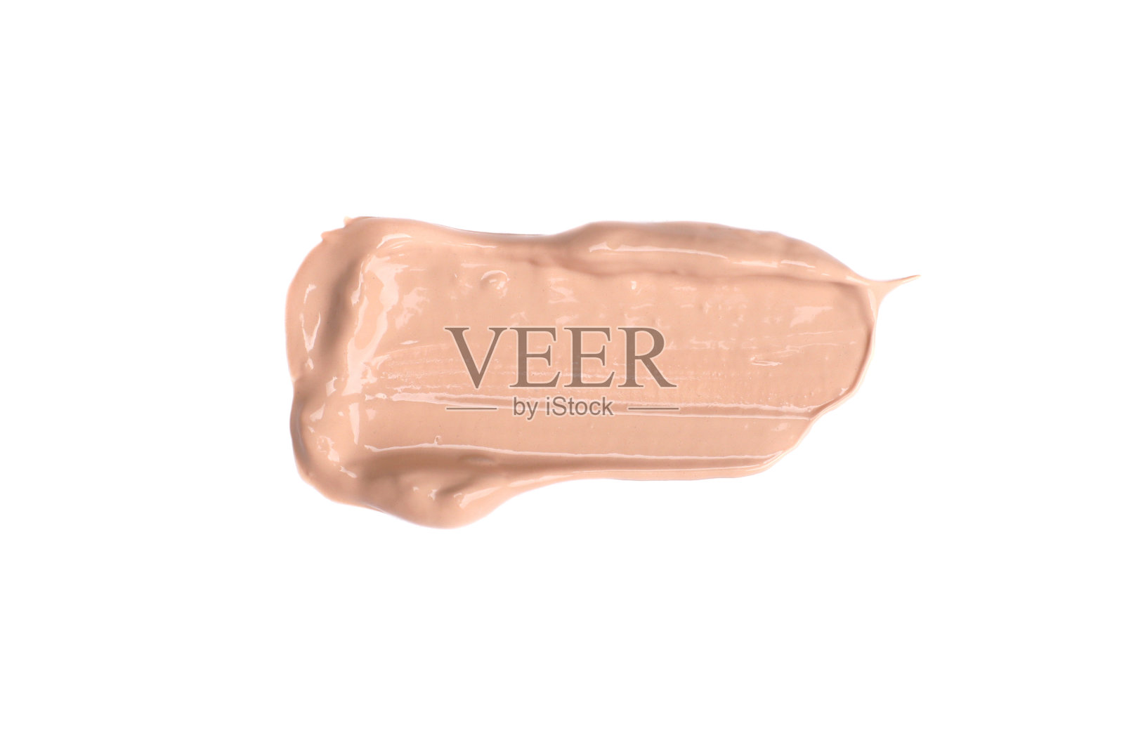 涂抹液体粉底霜隔离在白色上照片摄影图片