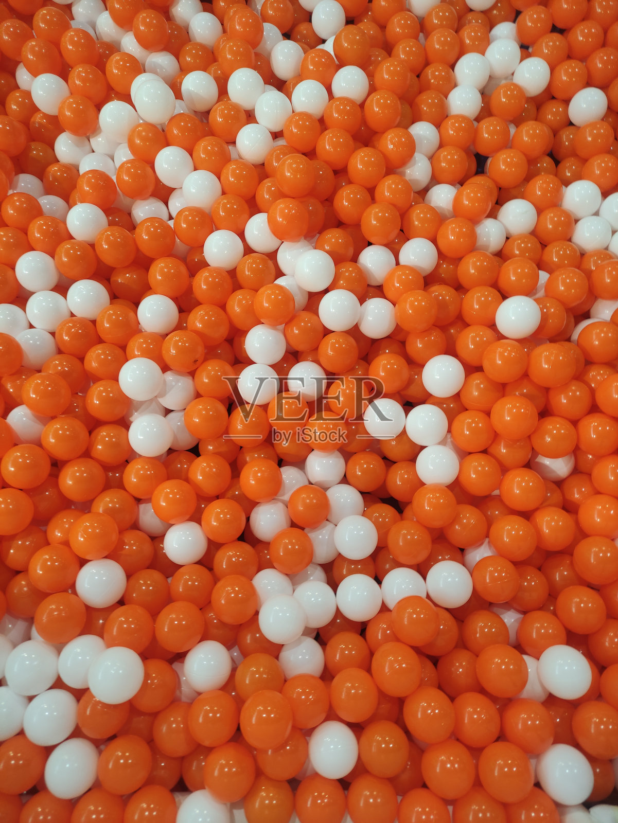 橙色的白色小球照片摄影图片