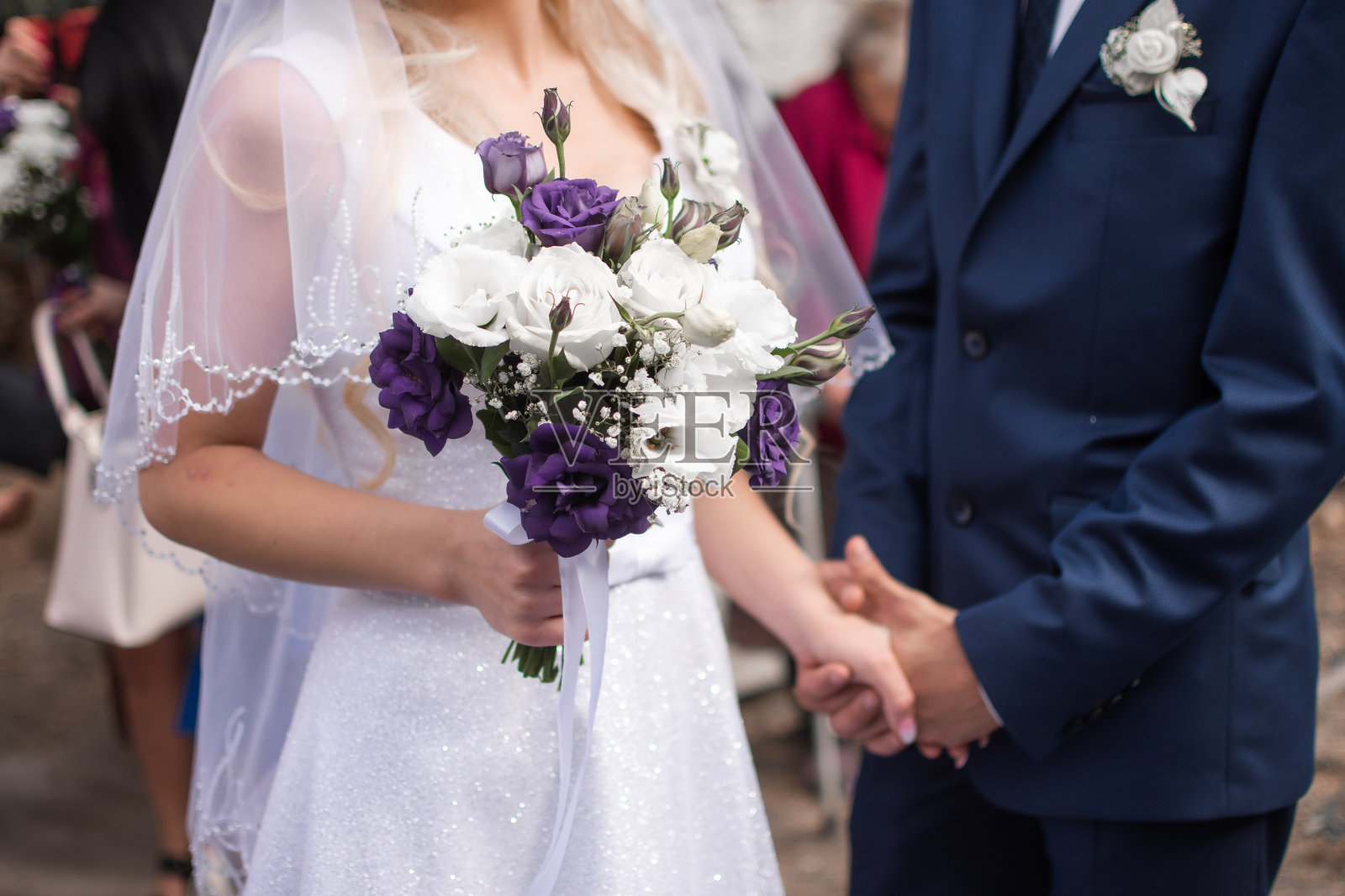 新娘手中的婚礼花束照片摄影图片