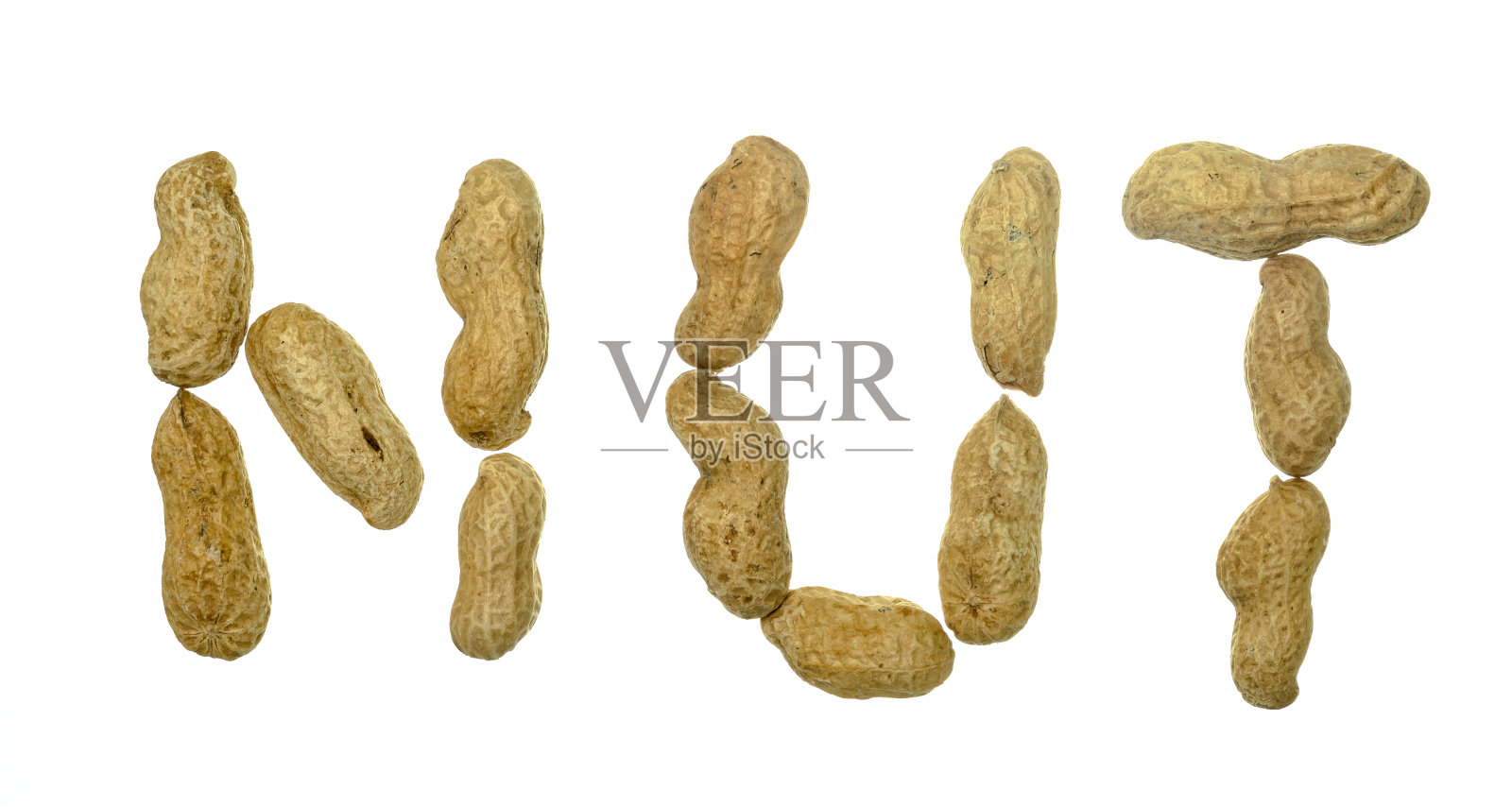 单词nuts与花生种子分开在白色背景上拼写照片摄影图片