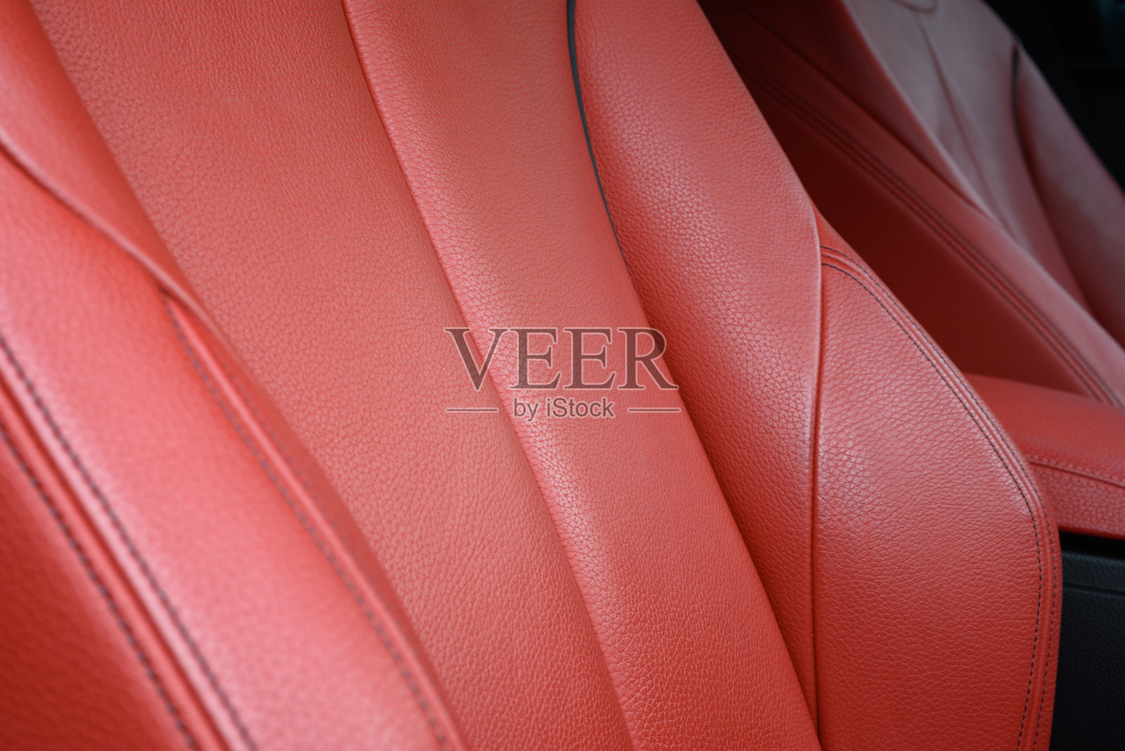 特写的红色皮革运动座椅照片摄影图片