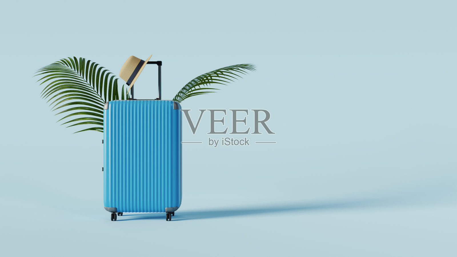 蓝色背景的旅行箱照片摄影图片