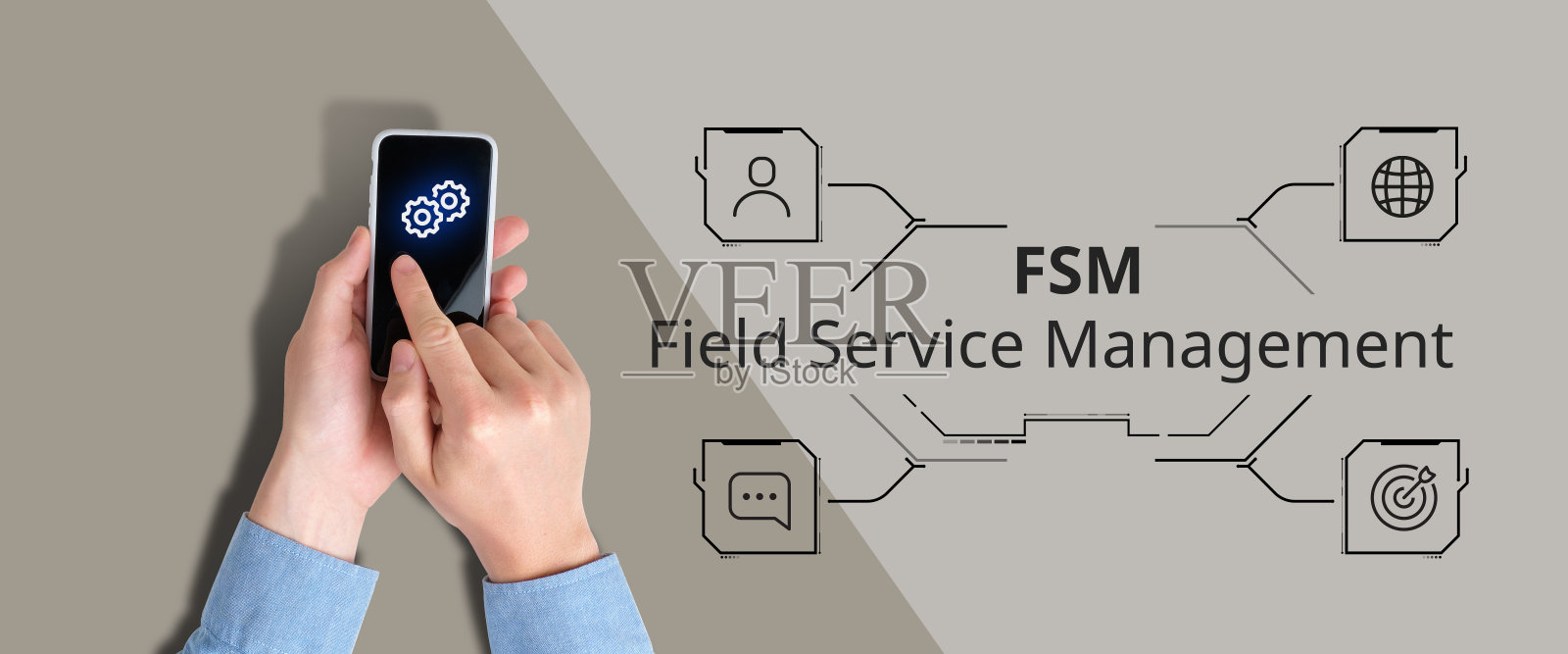 缩写FSM或现场服务管理。这个人在智能手机里工作。照片摄影图片