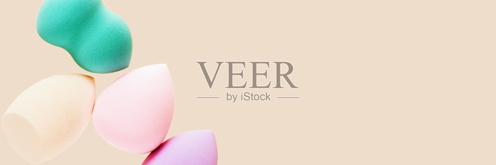 彩妆粉扑用于色调霜，粉底，遮瑕膏。前看来,宏。照片摄影图片