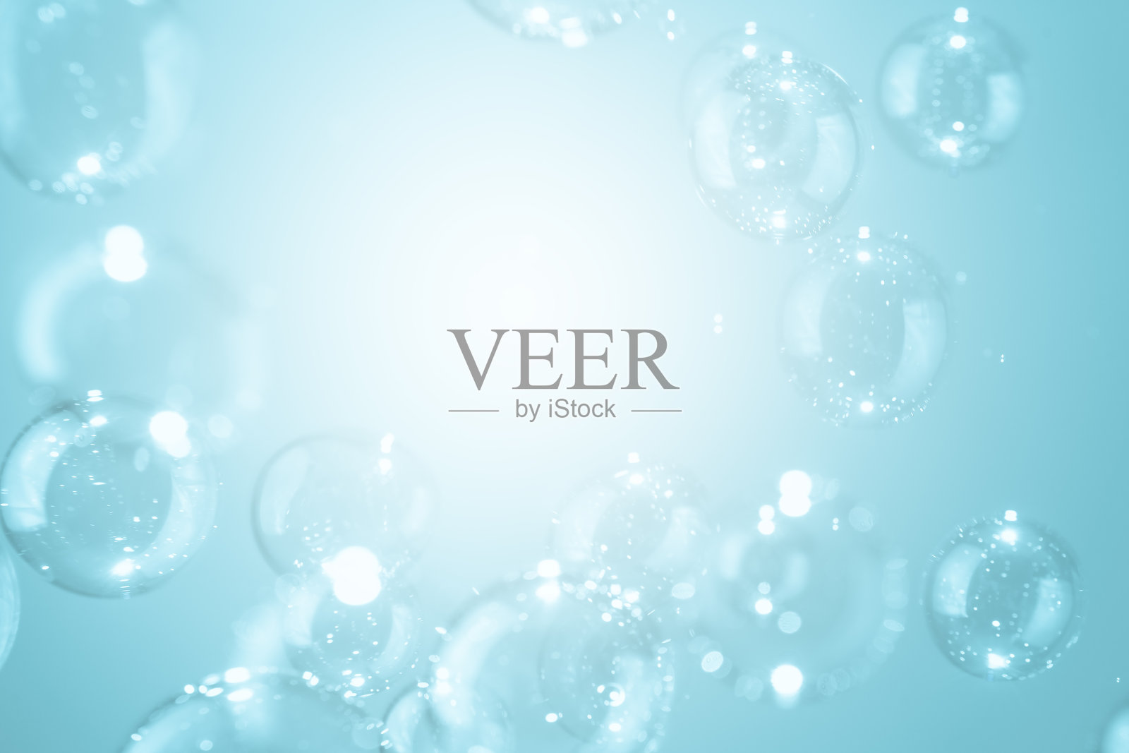 透明闪亮的蓝色肥皂泡背景。Sud能吸水。照片摄影图片