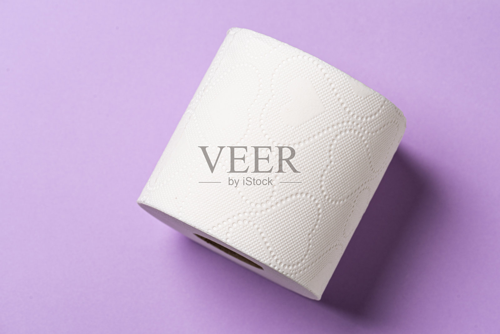 一卷厕纸的细节。照片摄影图片