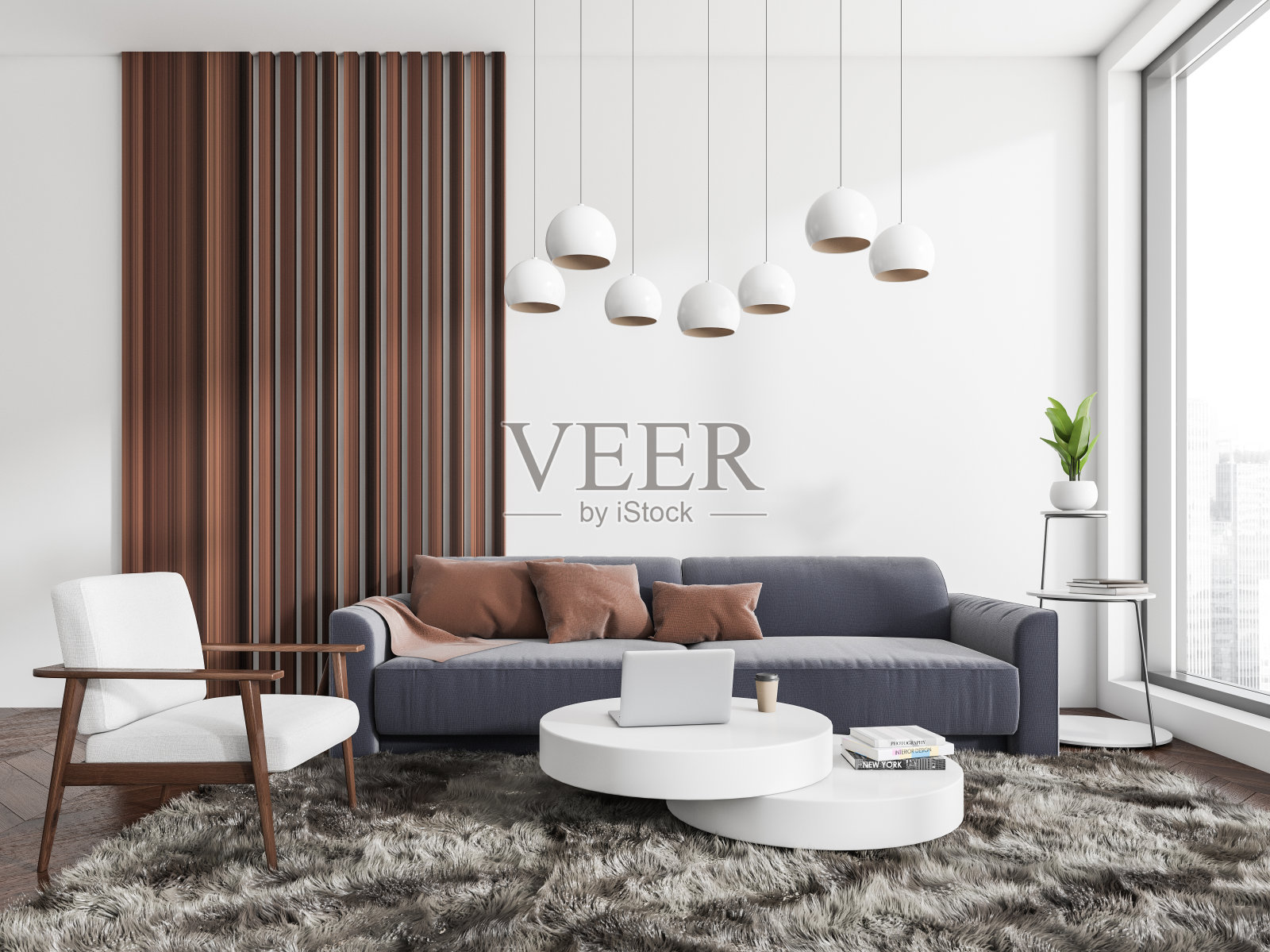 冷区室内设有沙发、扶手椅、茶几和全景窗照片摄影图片