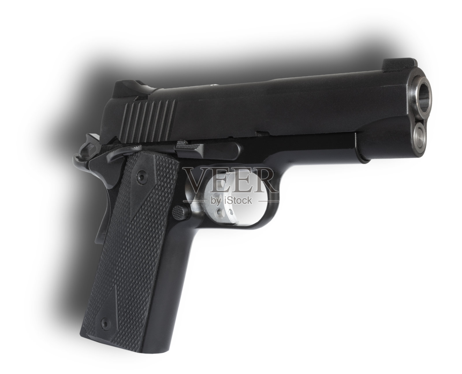 1911年半自动手枪后面的影子照片摄影图片