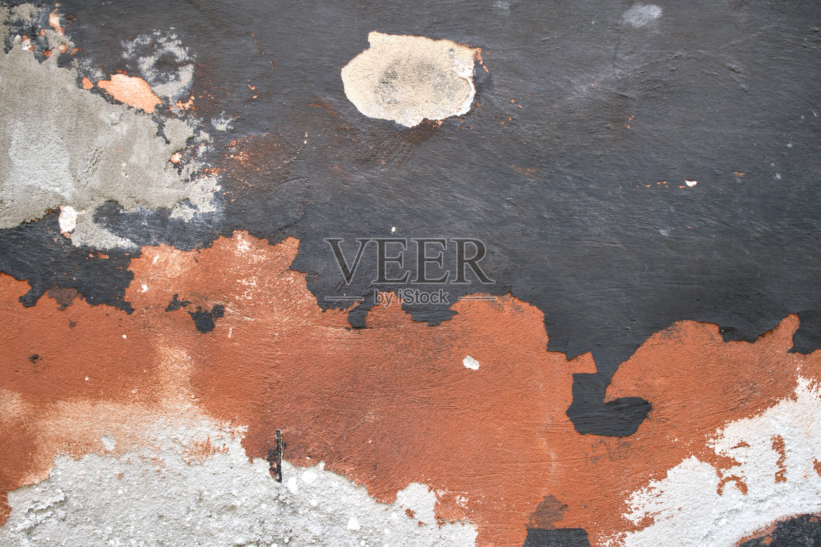 旧墙的纹理与开裂剥落的油漆。抽象枯燥乏味的背景照片摄影图片