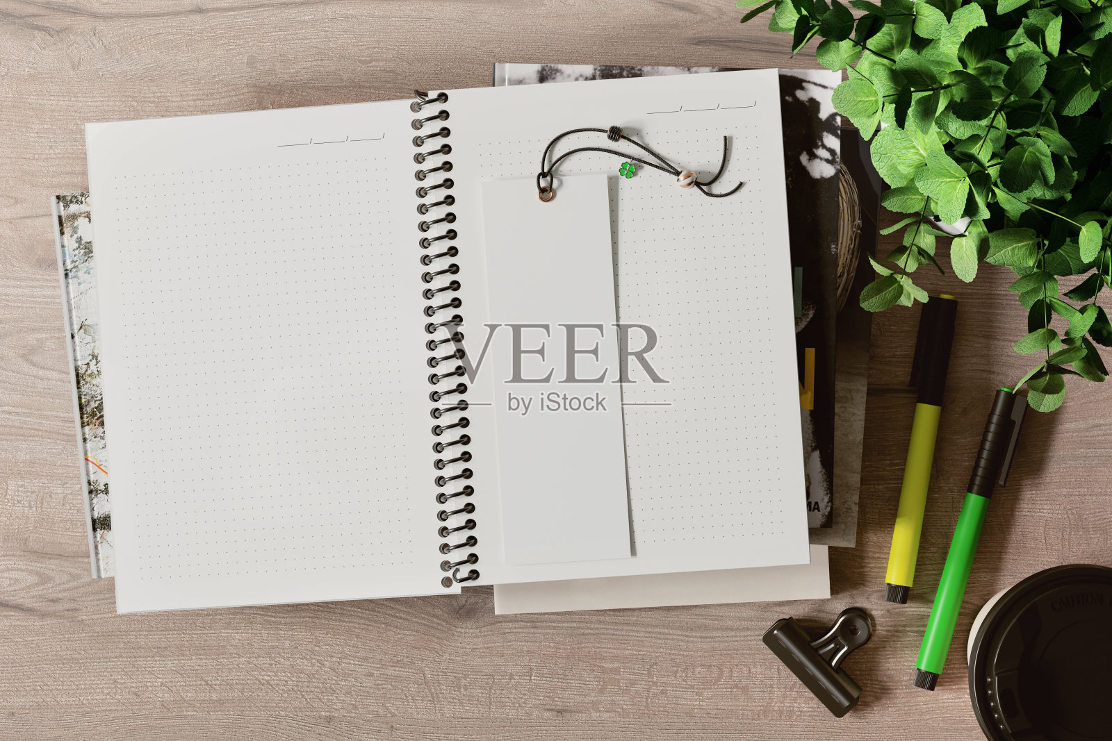 书签上开螺旋笔记本与文具项目的模型。三维渲染照片摄影图片