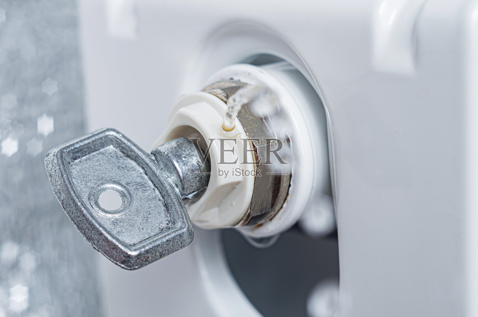 散热器放气阀5毫米方形键。照片摄影图片