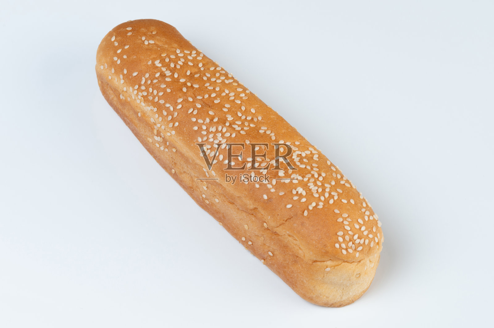 棕色热狗面包配芝麻照片摄影图片