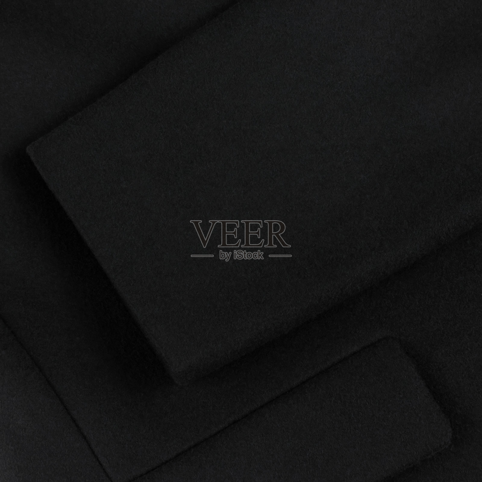 黑色羊毛大衣细节:袖子和口袋照片摄影图片